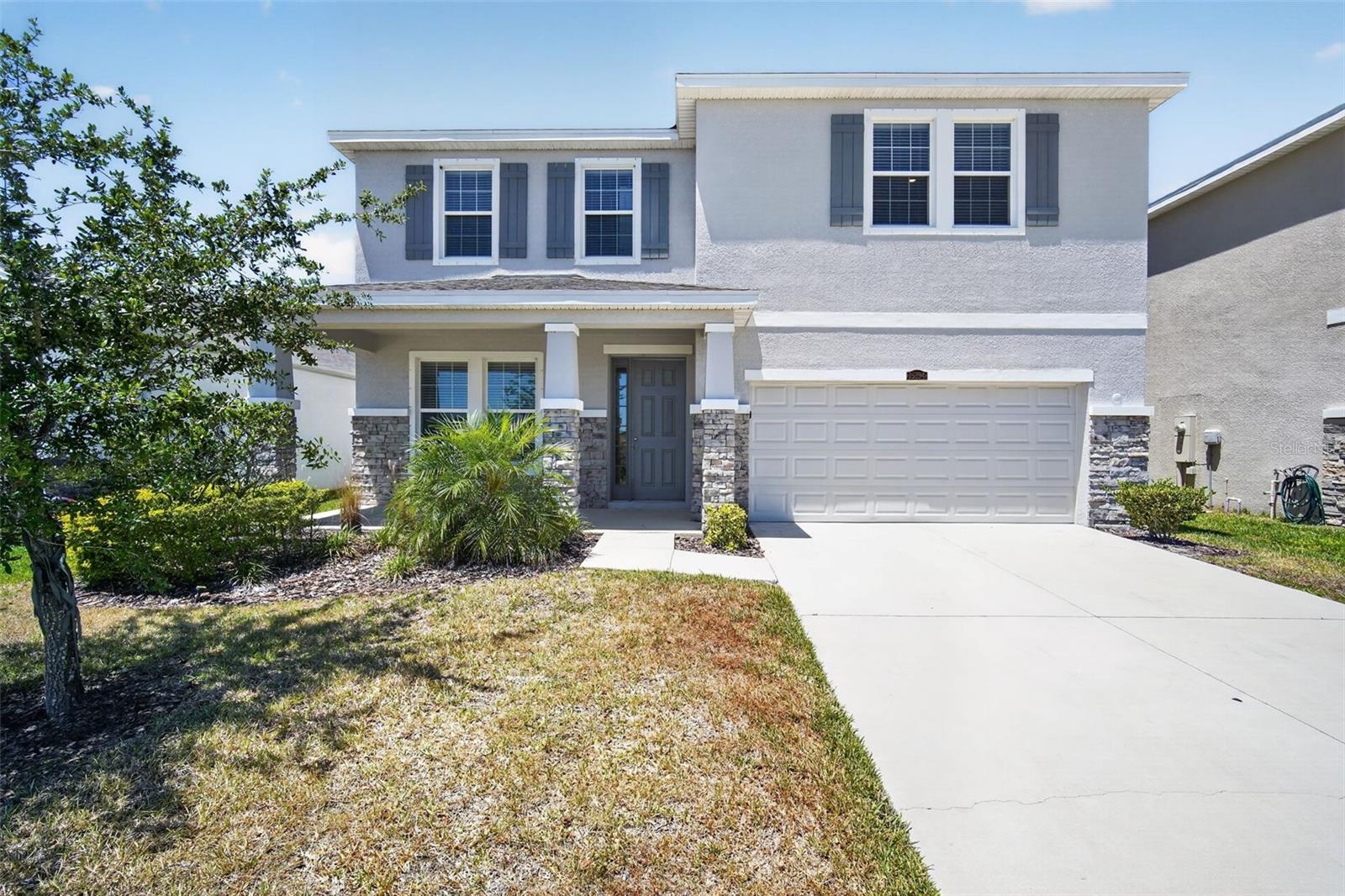 Nestled within the highly sought-after community of Odessa, this beautifully maintained residence at 15394 Sweet Springs Bend offers the perfect blend of luxury, comfort, and Florida lifestyle living. From the moment you arrive, you’ll appreciate the home’s impressive curb appeal, spacious layout, and upscale finishes designed for both everyday living and entertaining. Step inside to discover an open and inviting floor plan featuring abundant natural light, generous living spaces, and thoughtfully designed details throughout. The chef-inspired kitchen boasts modern cabinetry, premium appliances, ample counter space, and a large island overlooking the main living areas—ideal for gatherings with family and friends. The spacious primary suite serves as a private retreat with a spa-like ensuite bath and expansive walk-in closet. Additional bedrooms provide flexibility for guests, a home office space, or multi-generational living. Outdoors, enjoy your own private backyard oasis with plenty of room to relax, entertain, or add a future pool. Located near schools, shopping, dining, golf, and major commuter routes, this exceptional property combines peaceful suburban living with convenient access to everything in and around Tampa Bay. Don’t miss the opportunity to own this stunning Odessa home where style, space, and location come together perfectly.