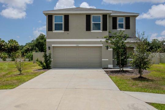 This all-concrete block constructed, two-story plan has a large open-concept downstairs which includes a well-appointed kitchen, living and dining area, and an outdoor patio. Upstairs, the oversized owner’s suite can easily fit a king-size bed and includes a large walk-in closet as well as an ensuite bathroom with double vanity. Three other bedrooms share a second upstairs bathroom while the loft provides an extra area for work or play. This home comes with refrigerator, built-in dishwasher, electric range, and microwave as well as a large lot and fenced in backyard.