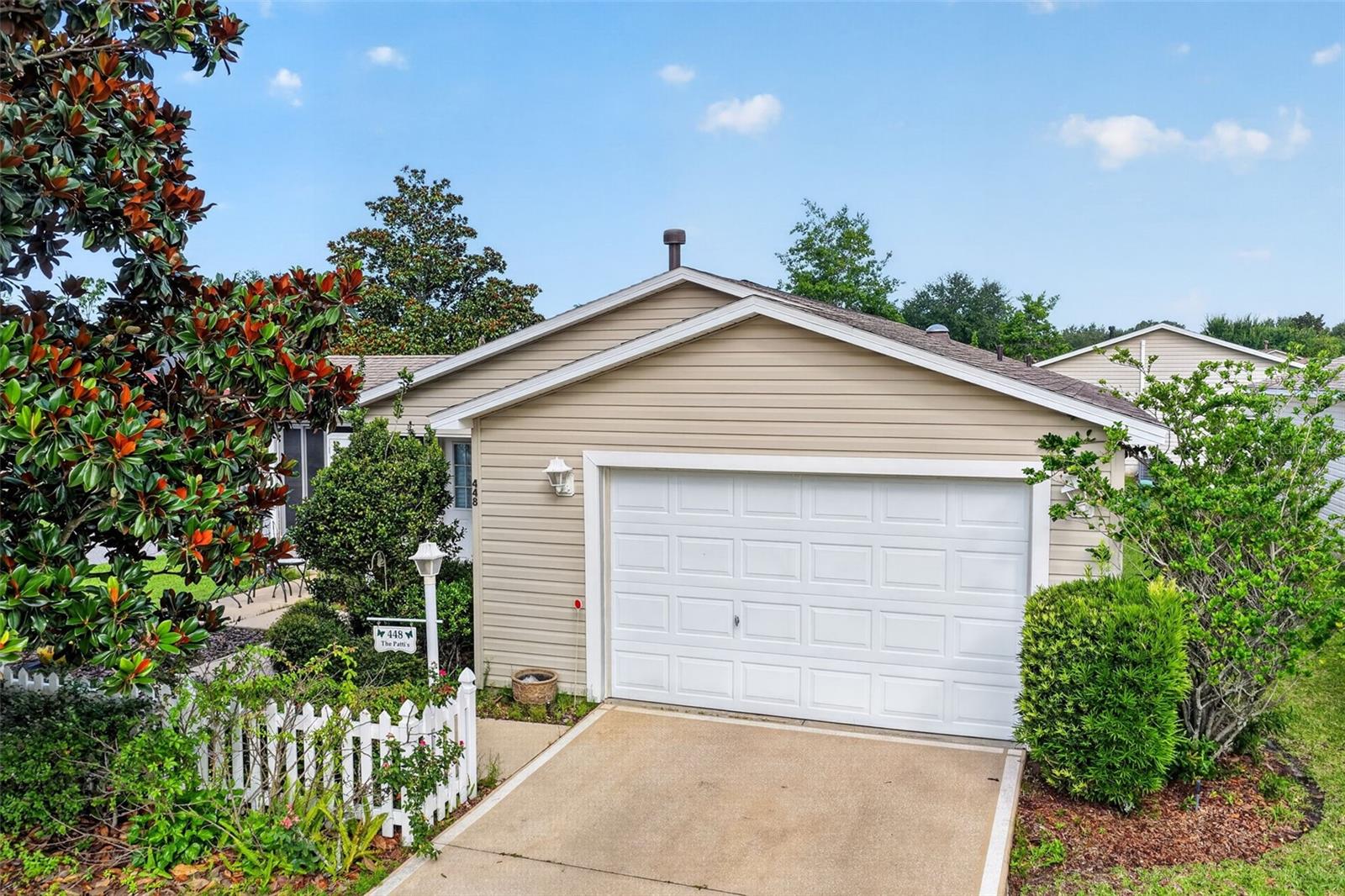 Welcome to this charming patio villa in the HIGHLY DESIRABLE VILLAGE OF BELVEDERE, ideally located just 1.5 MILES FROM LAKE SUMTER LANDING with convenient access to SHOPPING, DINING, GOLF, RECREATION, AND NIGHTLY ENTERTAINMENT. Situated on a DESIRABLE CORNER LOT in the Arlington Villas, this home features a ROOF REPLACED IN 2020, a VERY LOW BOND BALANCE, LAMINATE FLOORING THROUGHOUT, VAULTED CEILINGS, and an OPEN LIVING AND DINING AREA that feels bright and inviting. The ENCLOSED LANAI WITH ACRYLIC WINDOWS AND A CEILING FAN provides the perfect spot to enjoy your morning coffee or unwind in the evening. BEAUTIFUL LANDSCAPING enhances the LOW-MAINTENANCE FLORIDA LIFESTYLE. Whether you're looking for a SEASONAL GETAWAY, INVESTMENT PROPERTY, OR FULL-TIME HOME, this villa offers COMFORT, CONVENIENCE, AND AN UNBEATABLE LOCATION.