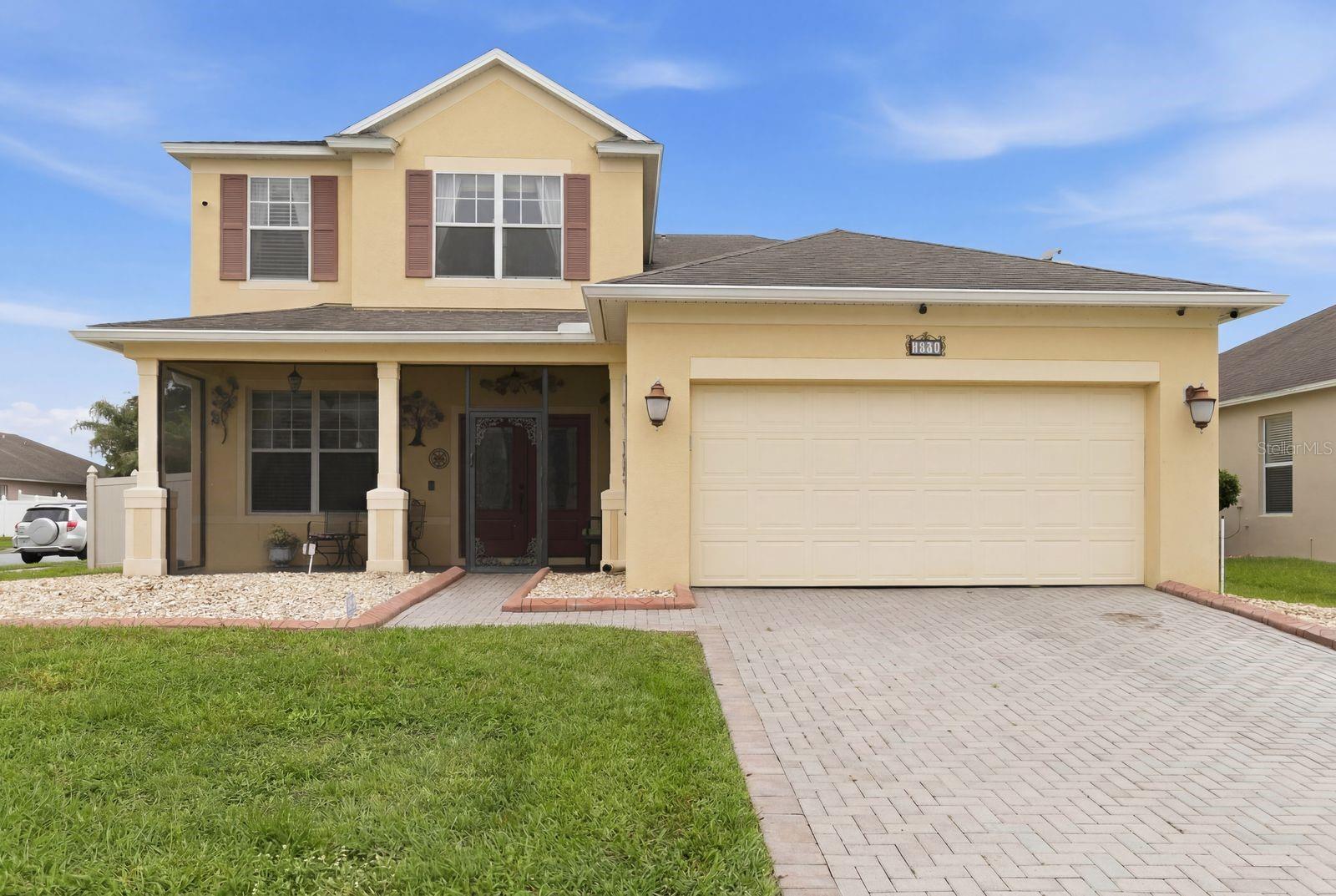 One or more photo(s) has been virtually staged. Welcome to exceptional living at 1821 Plantation Oak Dr! Boasting over 3,000 square feet of meticulously designed living space, this stunning 5-bedroom, 3.5-bathroom residence offers the perfect blend of elegance and everyday comfort. Step up to the welcoming front porch and enter a home designed for entertaining and relaxation. The expansive floor plan seamlessly connects a formal living room, a dedicated dining room, a cozy family room, and a versatile great room, providing endless possibilities for gatherings of any size. Beautiful luxury vinyl plank flooring flows seamlessly throughout the entire home, complemented by a striking wooden staircase.

The highly desirable first-floor master retreat offers unparalleled convenience and privacy. Upstairs, you will find generous secondary bedrooms, including a brilliantly designed Jack-and-Jill bathroom layout. Step outside to your private covered lanai and take in the expansive, fully fenced backyard—a perfect blank canvas for outdoor living, pets, or weekend barbecues. With its prime Orlando location and abundance of space, this home is an absolute must-see. Schedule your private tour today!