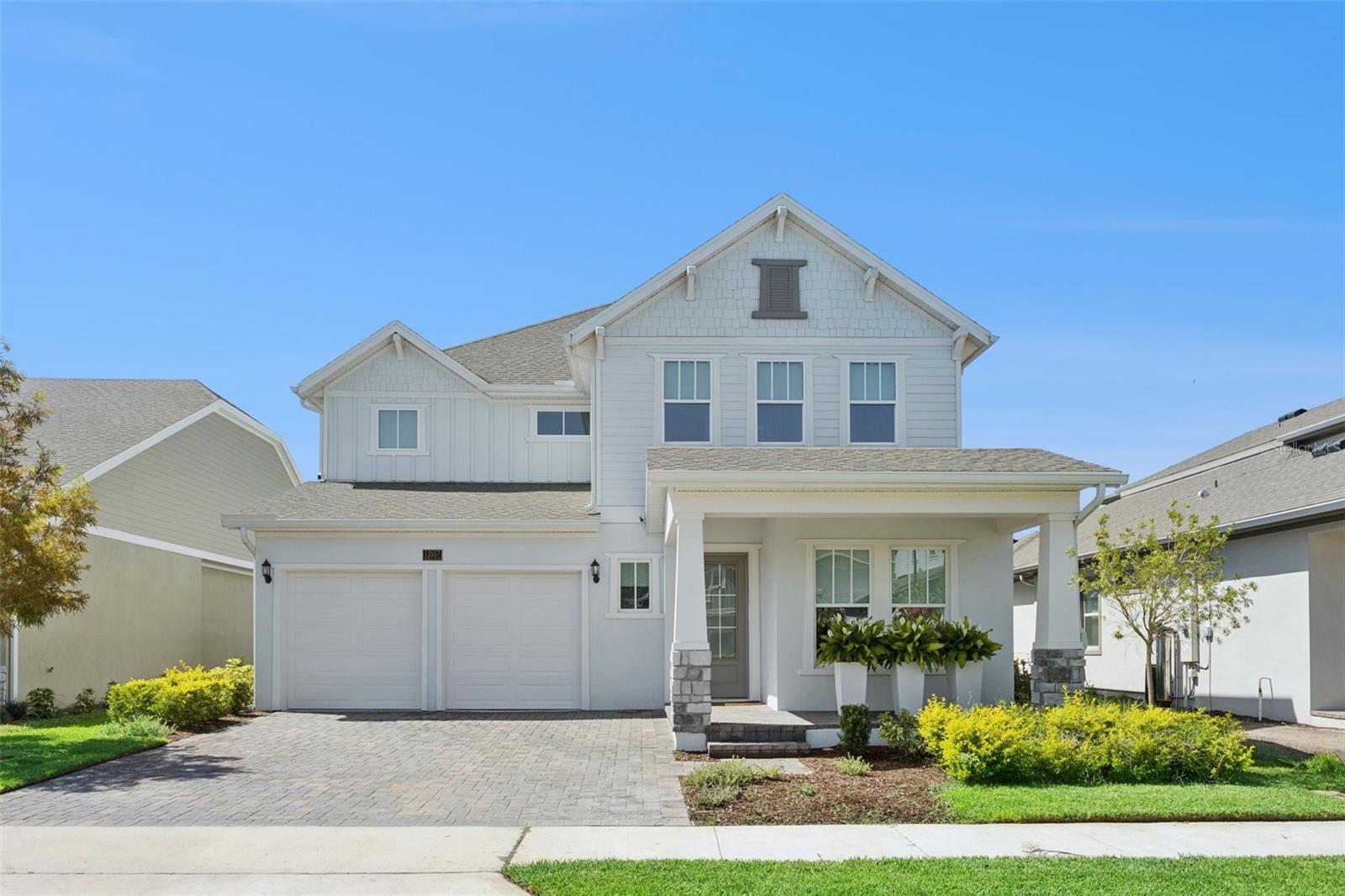 Lakefront living in Laureate Park, Lake Nona. Wake up to open water views, no rear neighbors, and a coveted lakefront homesite in a 2024-built home where the growing never had time to start. Imagine your mornings: coffee on the front porch overlooking the neighborhood, then back to a bright open-concept kitchen with an oversized quartz island that becomes the center of every gathering. With 4 bedrooms, 3.5 baths, and 3,452 square feet of light-filled space, there is room for everyone to spread out and one big reason to come together: the water view behind the house.
This is the Lake Nona lifestyle buyers search for. Residents enjoy access to the Laureate Park Aquatic Center, LP Fit gym, community gardens, dog parks, playgrounds, and miles of community trails. Evenings at Boxi Park and Canvas Restaurant. Weekends at the USTA National Campus or Nona Adventure Park. Minutes to Medical City, Nemours Children’s Hospital, the VA, UCF College of Medicine, and Lake Nona area schools, and about 15 minutes to Orlando International Airport. Few communities in Orlando combine amenities, community, and connectivity like Laureate Park, and few homes here offer true lakefront.
Built in 2024, this home delivers new-construction freshness without the builder wait: move-in ready, modern finishes, wood-look tile throughout the main living areas, designer pendant lighting, and a covered porch made for Florida evenings. Homes on the water in Laureate Park rarely come available. Schedule your private showing today.