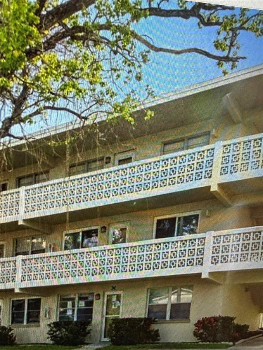 Enjoy carefree Florida living in this well-maintained 2-bedroom, 2-bath condominium located in the desirable 55+ Gateway Square community. Situated on the second floor with convenient elevator access, this light and bright residence features a spacious living and dining room combination, an eat-in kitchen, and a relaxing Florida room overlooking the beautifully landscaped courtyard and community pool.

Additional highlights include a dedicated storage room and an extra storage closet, providing plenty of space for your seasonal items and belongings.

Residents enjoy outstanding community amenities, including a clubhouse, sparkling swimming pool, and on-site laundry facilities. The building has successfully completed its milestone inspection, is in excellent condition, and offers fully funded reserves for added peace of mind.

The monthly HOA fee includes exterior building insurance, water, sewer, trash, cable, and exterior and grounds maintenance, making ownership easy and affordable.

Conveniently located near shopping, restaurants, medical facilities, and everyday conveniences, this move-in-ready condominium is the perfect place to enjoy the Florida lifestyle.