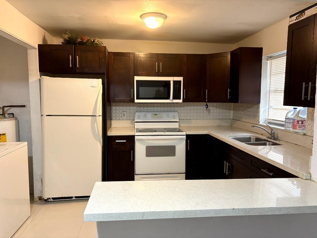 Spacious two bedroom / one bath apartment in a duplex. Very large rooms and a full bath, Central A/C, tile flooring. Washer and dryer in the unit. Tenant pays electric. water is paid by the owner. Current tenant is leaving July 31st but available to show. The apartment will be cleaned and available for lease on August 5th, 2026. Close to I-95, schools, beaches and the Swab Shop. No HOA! Rental application is on Rentspree.