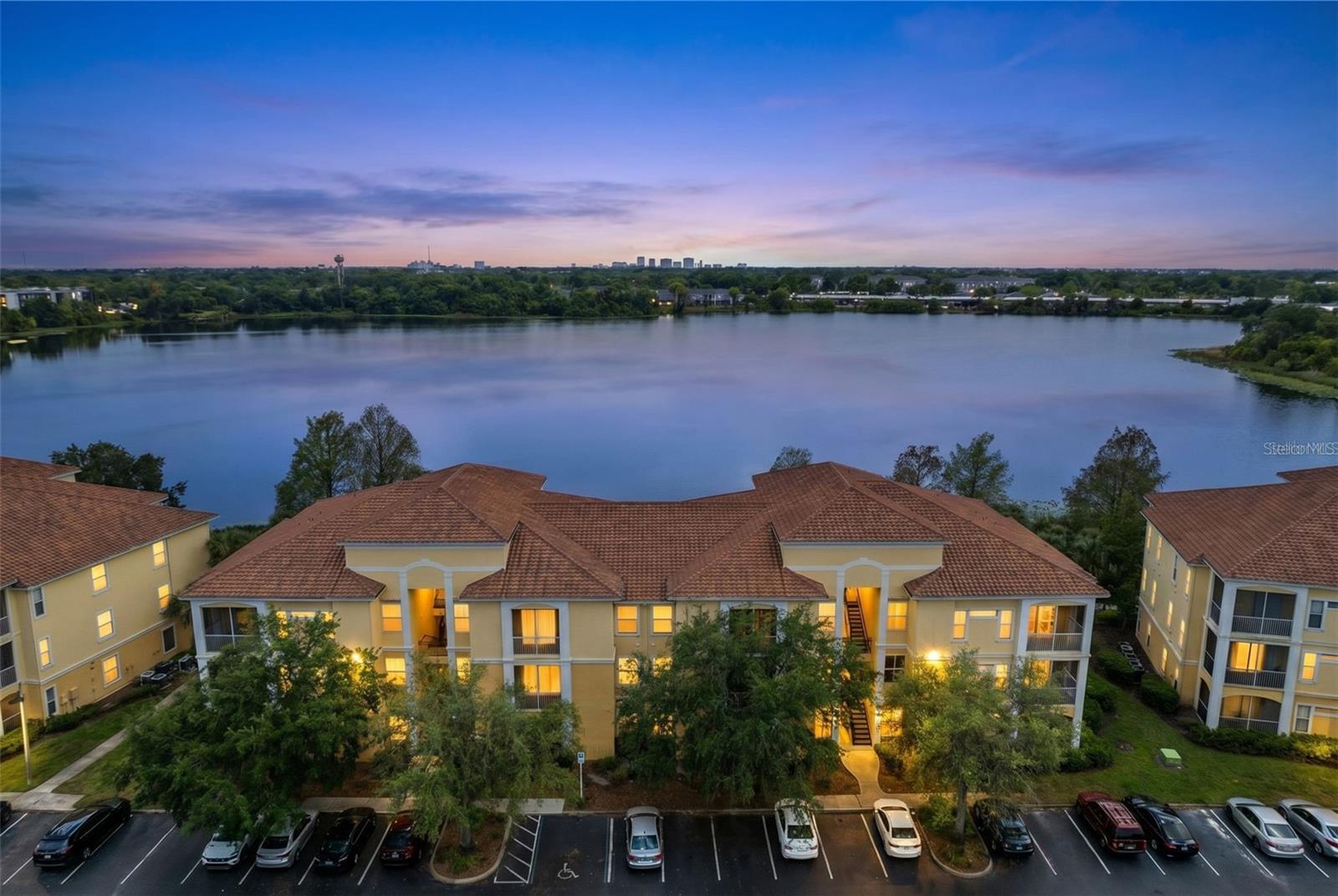 Welcome to Visconti! A Gated Waterfront Community in the Heart of Maitland. Step into an easy, low-maintenance living with this move-in ready 2-bedroom, 2-bath condo located on the third floor, offering added privacy and a peaceful, elevated feel. With all new flooring and fresh interior paint, this home is completely refreshed and ready for its next owner. The split floor plan layout offers a comfortable and functional flow, ideal for both everyday living and entertaining. Natural light fills the space, creating a bright and inviting atmosphere throughout. Whether you’re starting your day or winding down in the evening, this home delivers a relaxed, low-stress environment that truly feels like home. Located within the highly desirable Visconti community, residents enjoy resort-style amenities including a sparkling pool, fitness center, clubhouse, tennis and basketball courts, playground, and scenic walking paths with a waterfront gazebo. The gated entry and beautifully maintained grounds enhance both privacy and curb appeal. The HOA includes water service and valet trash, helping simplify your monthly expenses and making condo living even more convenient. Positioned in one of Maitland’s most central locations, you’ll have quick access to I-4, 414, and 434, with nearby shopping, dining, and entertainment options including Maitland Promenade, Winter Park Village, Cranes Roost Park, and Uptown Altamonte. Downtown Orlando is just a short drive away. If you’re looking for a fully updated, move-in ready condo in a gated community with strong amenities and an unbeatable location, this one checks all the boxes.