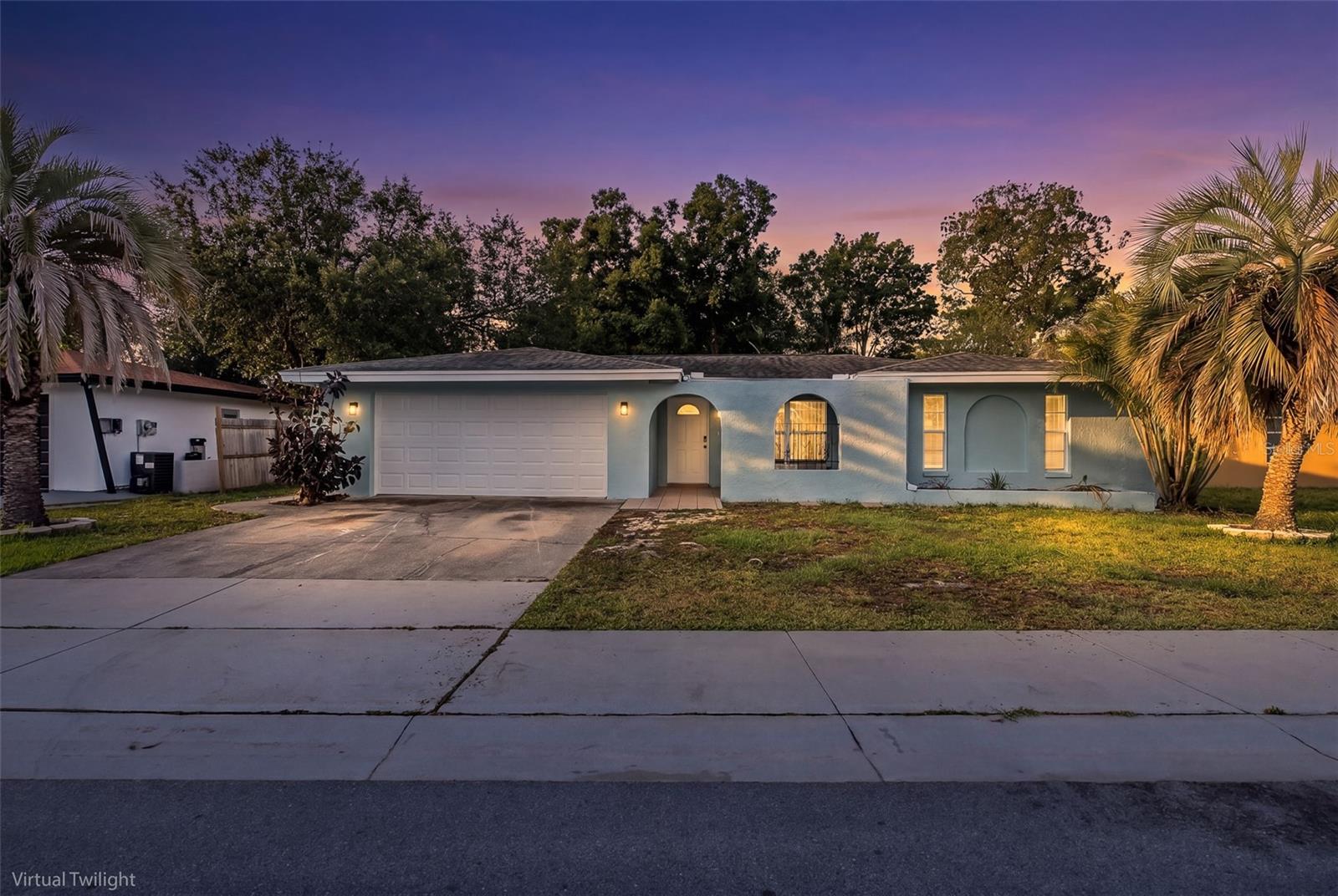This beautifully remodeled three-bedroom, two-bath home is perfectly located in Oldsmar at the top of Tampa Bay. Completely updated from top to bottom, it features a stunning new kitchen with stainless steel appliances, soft-close cabinetry, magnificent quartz countertops, and a cozy breakfast nook. A standout feature is how all three bedrooms are nicely separated for added privacy. The spacious master suite boasts a huge California-style walk-in closet, peaceful backyard views, and a gorgeous bathroom with a walk-in shower. The open-concept living space extends into a roomy bonus area at the back of the house, accented by tandem ceiling fans. From here, French doors lead to a fully fenced backyard, complete with a poured slab ready for a shed. A generous laundry room with a utility sink connects to the two-car garage, featuring a new hurricane-rated door and opener. Oldsmar offers unmatched access to the Pinellas Beaches, all that Tampa has to offer, plus its own great dining, excellent schools and shopping scene. Don’t miss the opportunity to check out this beautiful home!