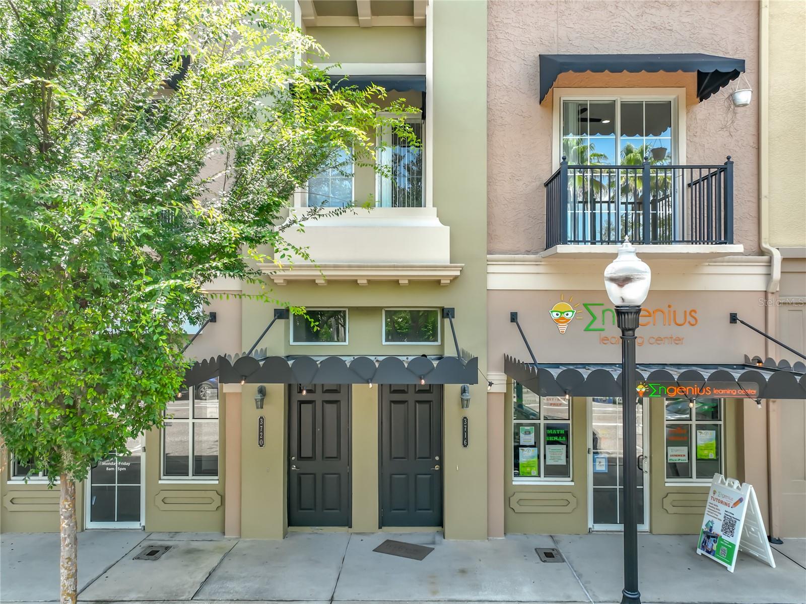 Experience upscale living in the heart of Downtown Avalon Park in this distinctive three-story townhome offering approximately 1,900 square feet of stylish and flexible living space. Located above commercial space, the residence features private entrances at both the front and rear of the building.

The main living level offers an open and inviting layout with soaring ceilings and newly installed luxury laminate flooring. The spacious kitchen features granite countertops, abundant cabinetry, and plenty of room for cooking and entertaining. A versatile third room  on this floor, may be used as a bedroom, home office, den, or flex space. This level also includes a half bathroom and two balconies—a front balcony overlooking the downtown area and enjoying the surrounding activities this community is known for.   A large rear balcony ideal for relaxing and sunbathing.  The unit has been refreshed with bright interior paint.   

The upper level features two generously sized bedrooms with walk-in closets. The primary suite includes a spacious ensuite bathroom with a walk-in shower and separate garden tub. The second bedroom overlooks the Avalon Park Amphitheater and is conveniently located near an additional full bathroom. A washer and dryer are included for added convenience.  Newer carpets on the upper level.   

Located directly across from the Marketplace and Avalon Park Amphitheater, this home offers a front-row seat to the community’s year-round festivals, parades, concerts, and neighborhood events. Restaurants, parks, Publix, CVS, medical offices, shops, and an electric vehicle charging station are all just steps away.

Avalon Park is a thoughtfully designed community known for its walkable downtown, welcoming atmosphere, and vibrant lifestyle. Open parking is available. This one-of-a-kind townhome combines comfort, convenience, and an unbeatable location. Schedule your private showing today.  Serious inquiries only:  https://apply.link/n-67Xtk