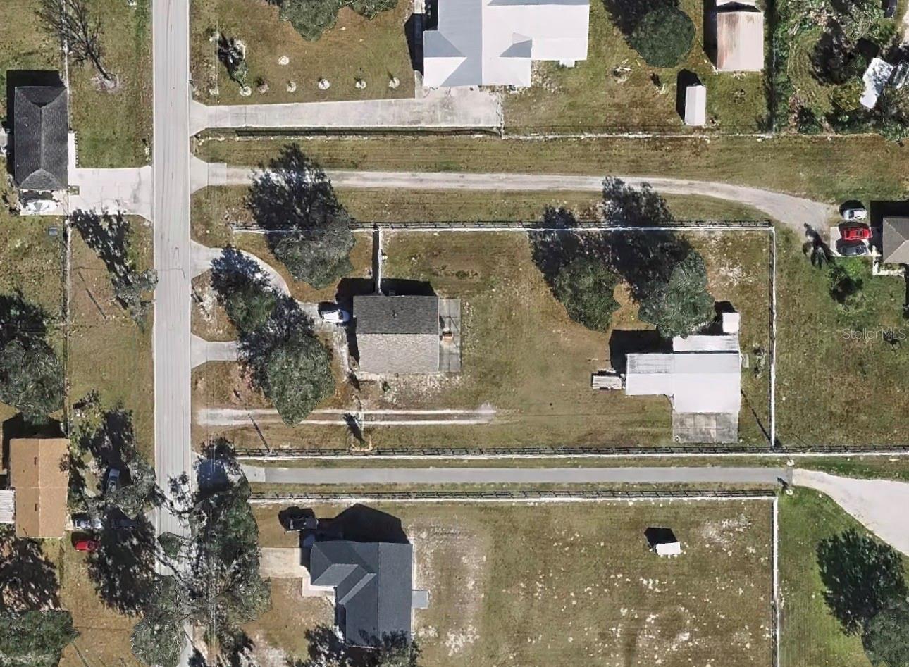 2019 Roof, 2022 AC, 2021 Water Heater, New Emergency generator hookup, new lighting, newer appliances, LVP Flooring, 40x36 Metal Barn on concrete slab, 2 RV plugs with 20x24 attached concrete carport and an additional 20x35 contrete pad. The Barn is 1,440 sqft in the back. Premium vinyl Fencing on 0.83 acres. Perimeter Water Lines with cutoff valves. New smoke detectors.