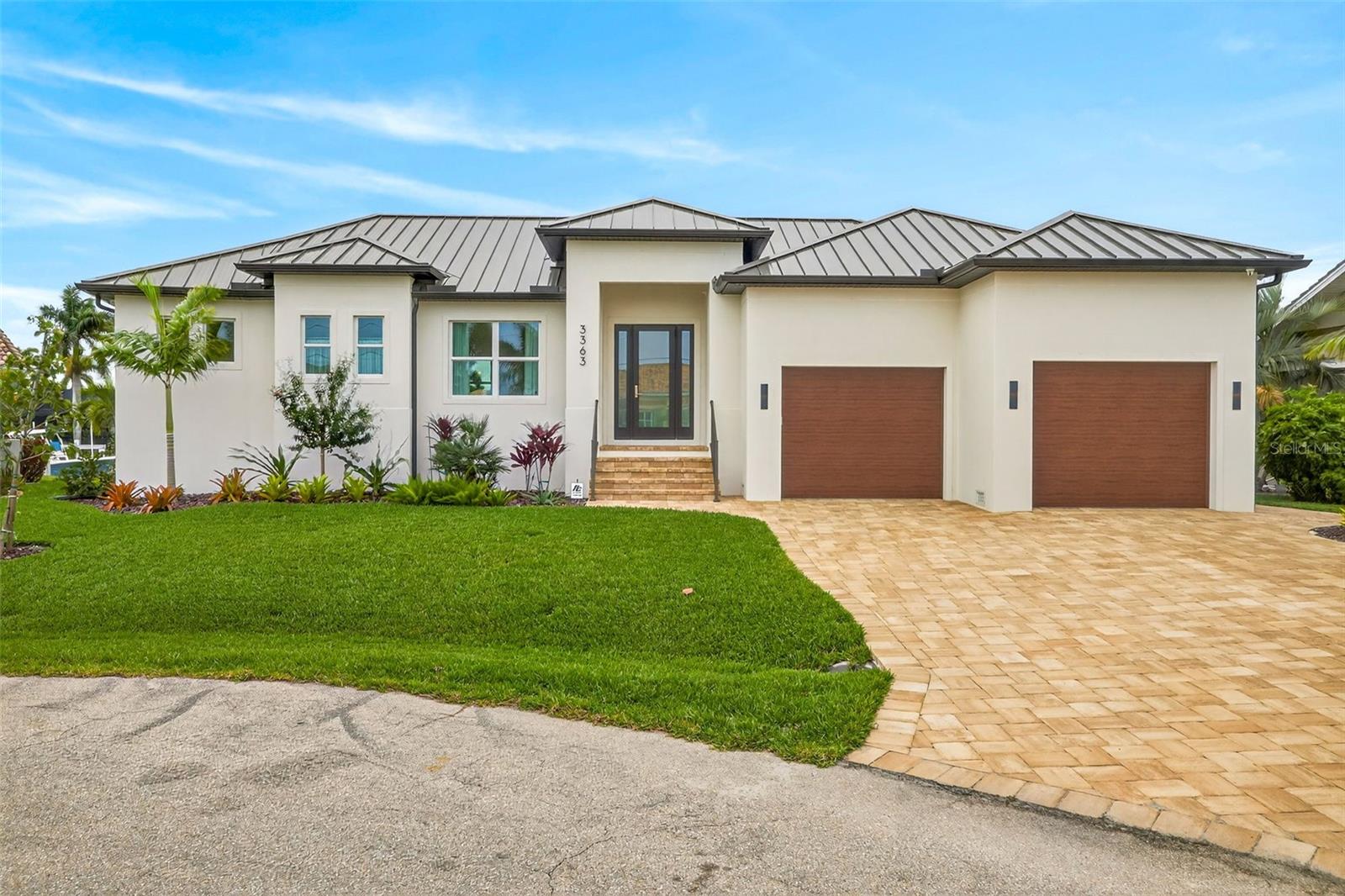 Custom Built 2025 Pool Home with Direct Gulf Access located in the highly sought after Punta Gorda Isles. A Boater’s Dream, with a concrete dock and boat lift. This home features 3 Bedrooms, 2 Baths Plus a Den, with many custom features, Heated Saltwater pool,  Hurricane Windows and Door, Tall Ceilings, Custom Built-in cabinetry in the Office/Den, Dining room, Laundry room and Living Room a chief inspired kitchen with floor to ceiling cabinetry & waterfall island, a fenced yard, Outdoor Kitchen w/Grill and a long lasting metal rood.
This home is located near shopping, entertainment, the Fisherman’s Village, and a short car or boat ride to many sandy beaches like the famous Boca Grande known for being the “Tarpon fishing capital of the world”