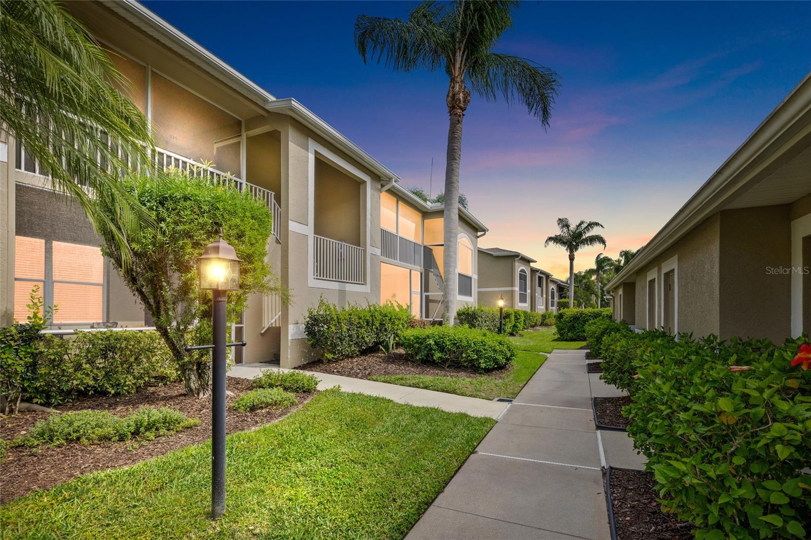FULLY FURNISHED ! Welcome to 5231 Mahogany Run Ave, Unit 325 - One of Sarasota’s most sought-after gated, resort-style communities. This second-floor residence features vaulted ceilings, an open, airy layout, and peaceful views overlooking the 13th hole and adjacent nature preserve.
This well-designed 2-bedroom, 2-bath floor plan includes a dedicated office/den that can easily function as a third bedroom, ideal for guests, a home office, or added flexibility.

The main living area flows directly to both the front and rear screened lanais, both recently upgraded with new tile - perfect for enjoying golf course and preserve views. Inside, you’ll find laminate flooring throughout the main living areas and bathrooms, with soft carpet in the bedrooms for added comfort. A built-in wet bar in the living room adds a great touch for entertaining.

The kitchen offers a clean, functional layout with ample cabinetry and a seamless connection to the dining and living areas. The primary suite is privately situated with generous closet space and an en-suite bath. The guest bedroom is well-positioned and paired with an updated guest bathroom, giving a fresh, modern feel for visitors.

Additional highlights include a newer A/C system (2022), a new roof, one-car garage, and open guest parking. The home is being offered fully furnished, with everything included. Making this a true turnkey opportunity.

Condo fees are highly inclusive, covering unlimited golf, water, sewer, trash, cable, and internet—an ideal setup for golfers or buyers seeking a low-maintenance second home.

Heritage Oaks offers an 18-hole golf course, five heated pools, tennis courts, fitness center, 24-hour gated security, and a vibrant clubhouse with dining and year-round events.

A clean, flexible, and fully equipped opportunity in one of Sarasota’s most established golf communities.