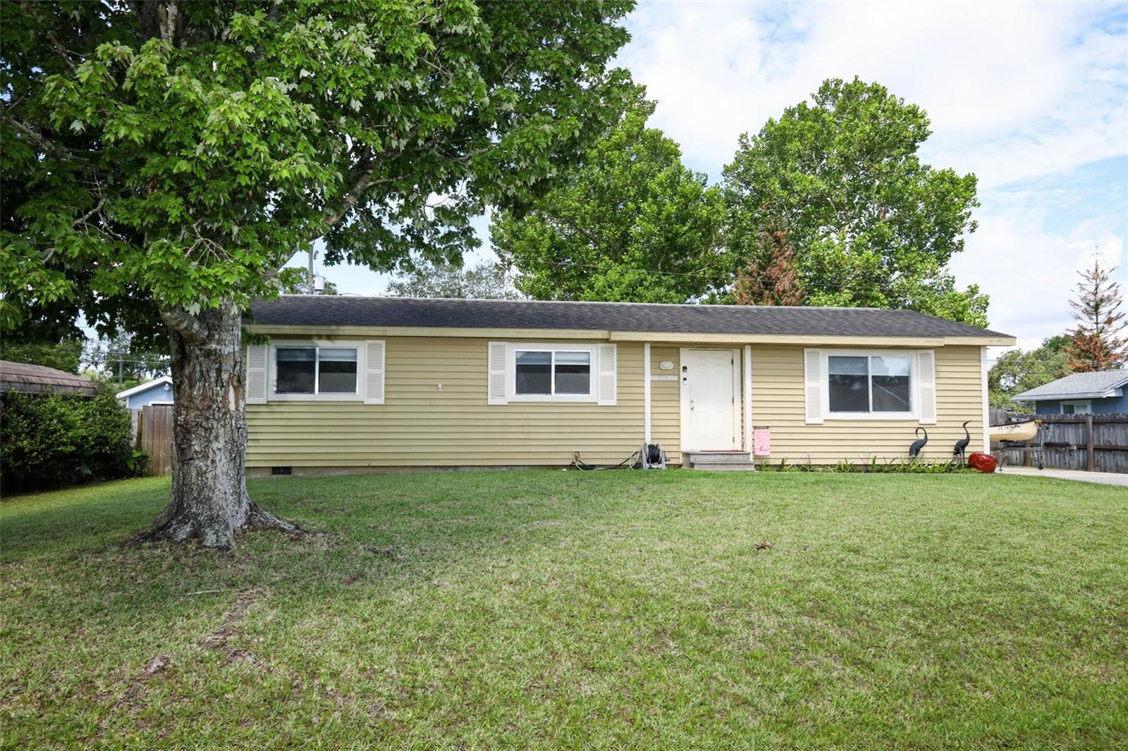 Welcome home to this immaculately maintained 3-bedroom, 2-bath residence offering comfort, convenience, and peace of mind with major updates already completed. The roof, HVAC system, and water heater were all replaced in 2018, with the AC most recently service in May 2026. Inside, you'll find durable laminate and tile flooring throughout - absolutely no carpet-creating a clean, modern look that's easy to maintain. The home is also equipped with a Ring doorbell and security cameras for added convenience and security. A transferable termite bond provides additional value and confidence for the new owner. Step outside to enjoy the huge, fully usable backyard, perfect for entertaining, relaxing, or creating your own outdoor oasis. Gather around the fire pit on cool evenings, and take advantage of two brand-new storage sheds, each measuring 10'x 20', offering plenty of space for tools, hobbies, or recreational equipment. Best of all, there's NO HOA! Conveniently located near parks, shopping, restaurants, and schools, this home is also just minutes from a beautiful community park featuring tennis courts, basketball courts, a dog park and New Smyrna Beach... Easy access to I-95 and other major thoroughfares makes communiting a breeze. Don't miss this move-in-ready gem that combines updated systems, outdoor space and an unbeatable location. Call today for your private showing!