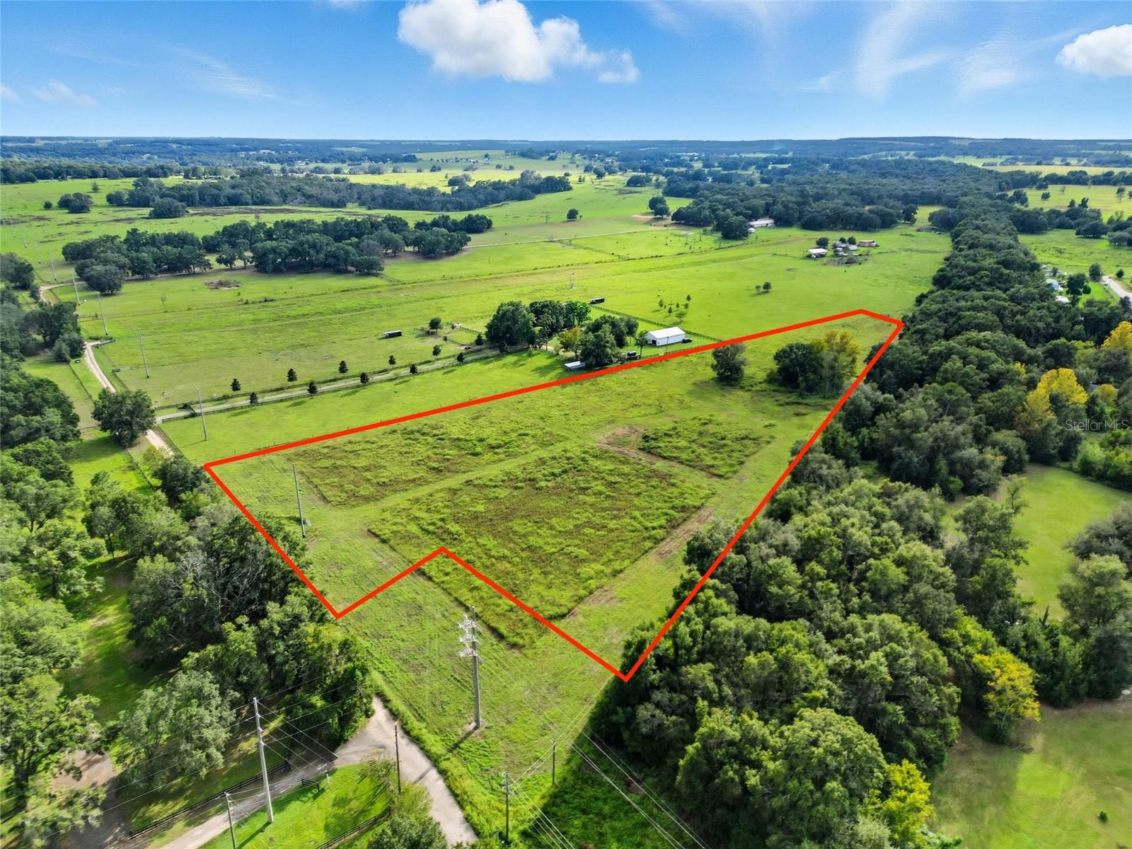 Put this on YOUR LIST OF MUST SEE!!  Excited to show you 10 acres of unimproved land, perfect for your dream home or mini-farm.
This expansive parcel offers a unique blend of country living and convenience, situated just a few miles outside of charming Dade City. Zoned for agriculture or residential use, it presents endless possibilities for building your dream home, establishing a mini-farm, or even subdividing for investment opportunities. WELL WATER AND POWER CONNECTED!!  Whether you envision a spacious estate, a horse ranch, or a livestock property, this land provides the space and flexibility you need, and endless opportunities. You can enjoy the peace and quiet of country living while remaining close to shopping, dining, and major roadways. This is a rare find in a prime location.