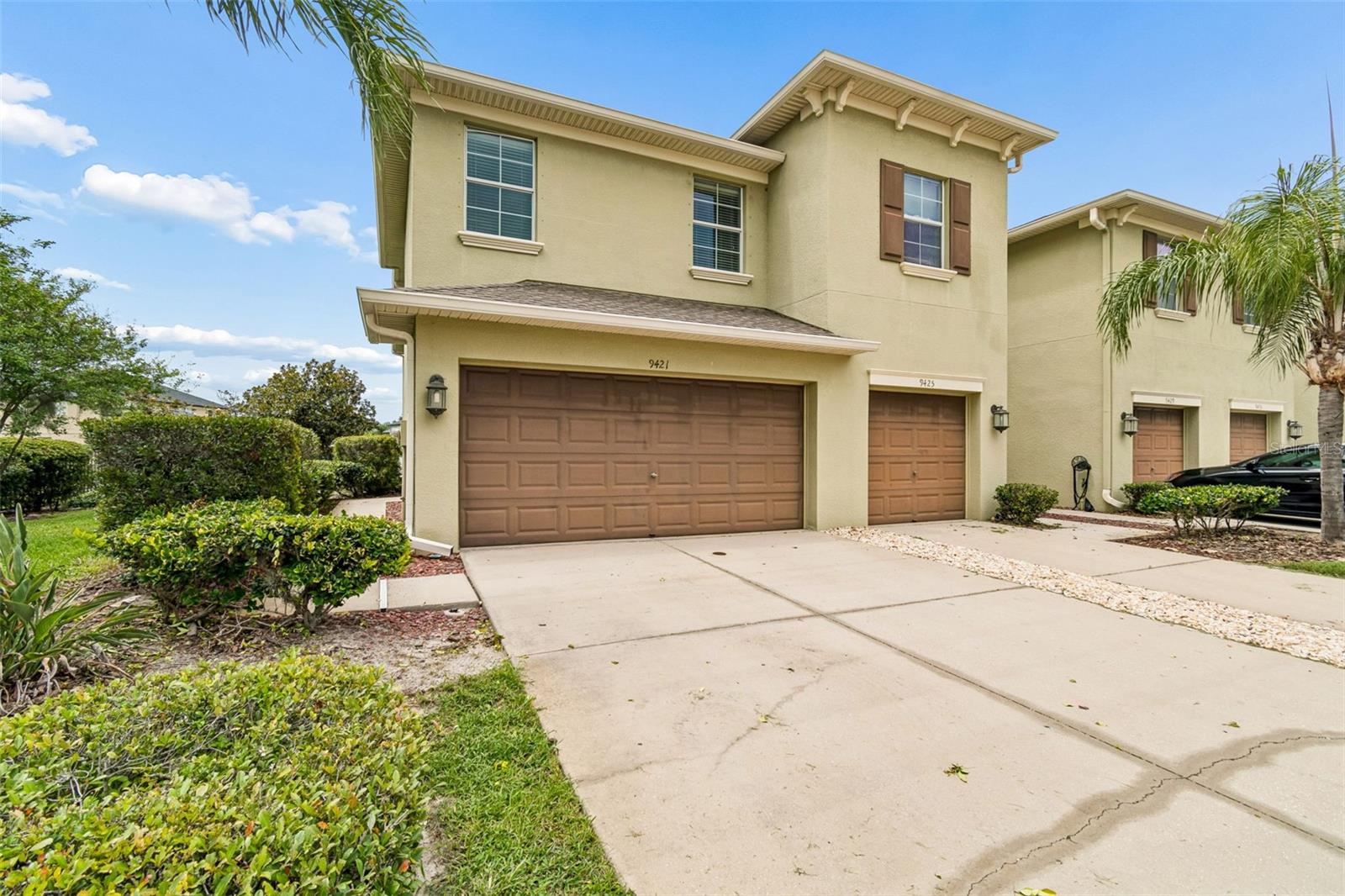 Welcome to this beautifully updated 3 bedroom, 2.5 bath end unit townhome located in the highly sought after Trinity, Florida area, offering the perfect blend of modern upgrades, spacious living, and low maintenance convenience. Positioned at the end of the street with no direct neighbor on one side, this rare end unit property provides added privacy, extra windows, abundant natural light, and a side yard area rarely available in townhome communities. Featuring a desirable 2 car garage with additional driveway parking, this move in ready home delivers exceptional curb appeal and functionality from the moment you arrive.
Inside, you’ll find fresh interior paint, brand new flooring throughout the main living areas, new upstairs carpeting, updated light fixtures, soaring ceilings, and an open-concept layout designed for both everyday living and entertaining. The spacious eat in kitchen features granite countertops, extensive cabinetry, pantry storage, bar seating, and seamless flow into the oversized living and dining areas, creating a bright and inviting atmosphere throughout the home.
One of the standout features of this property is the oversized screened and extended lanai, offering significantly more outdoor living space than most homes in the community. Complete with peaceful views and an exterior storage closet, this outdoor space is ideal for relaxing, dining, or entertaining year round.
Upstairs, all three bedrooms are generously sized, including a massive primary suite with a large walk-in closet, soaking tub, separate shower, dual vanity space, and ample room for oversized furniture. The secondary bedrooms offer spacious closets and flexible layouts ideal for guests, home offices, or growing families. An upstairs laundry room adds additional convenience and functionality.
Located near top rated schools, shopping, restaurants, medical facilities, golf courses, parks, and the Veterans Expressway for easy Tampa commuting, this updated Trinity townhome offers exceptional value in one of Pasco County’s most desirable communities. Perfect for buyers seeking a move in ready home with modern finishes, extra privacy, a premium end unit location, and low maintenance Florida living.(ROOF-2022)(A/C-2011)(W/H-2011)