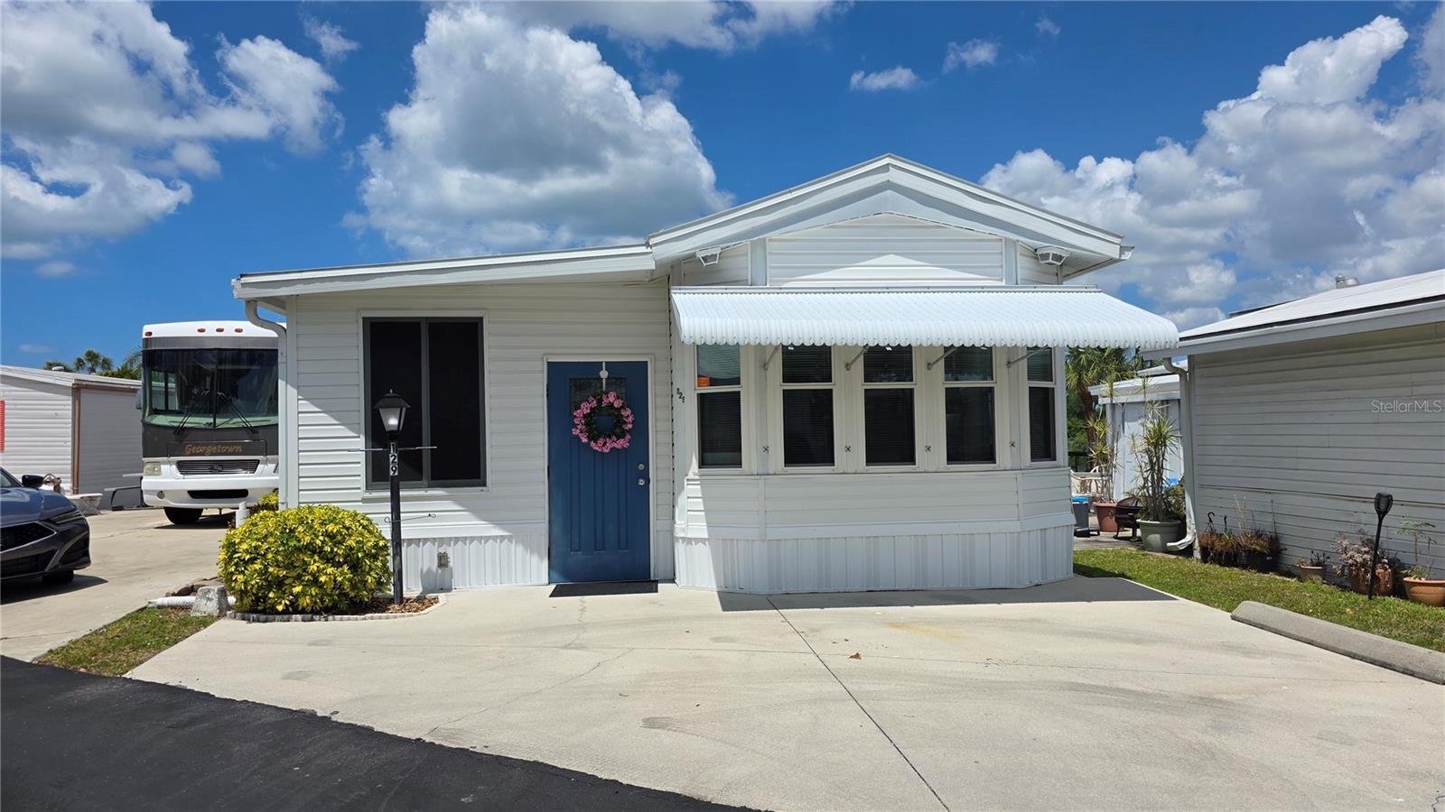 Charming and well-maintained 1-bedroom, 1.5-bath park model offered fully furnished and move-in ready. Recent updates include new windows and a new walk-in shower, adding comfort and value. This inviting home also includes a golf cart (bonus!) for easy enjoyment of the community and surrounding area. Residents enjoy access to a community pool, shuffleboard, and an active social atmosphere with plenty to do. Conveniently located near Sarasota-Bradenton International Airport, Interstate 75, shopping, dining, and everyday conveniences. A wonderful opportunity for seasonal or year-round Florida living.