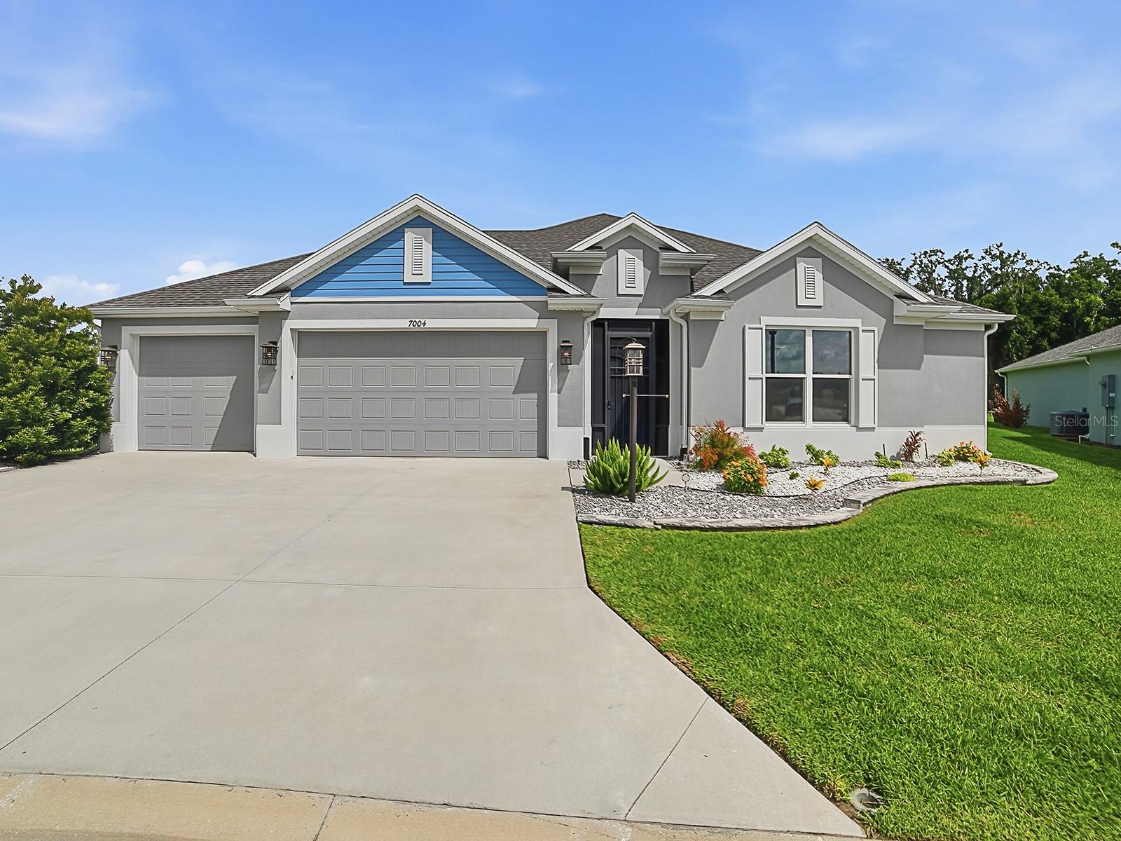 Welcome to luxury living in The Villages! Ideally located just minutes by golf cart from Eastport Town Square, this beautifully maintained 3-bedroom, 2.5-bath home offers an exceptional blend of elegance, comfort, and resort-style amenities.

Designed with an open, light-filled floor plan, the home features ceramic tile flooring, QUARTZ COUNTER TOPS, custom crown molding, soaring 10-foot ceilings, and powered zebra blinds throughout. The spacious chef's kitchen is a dream for entertaining, showcasing beautiful countertops, enhanced appliances, abundant cabinetry, and a large walk-in pantry.

The private owner's suite offers a spa-inspired retreat with a walk-in Roman shower and generous closet space. Every detail of this home reflects quality craftsmanship and meticulous care.

Enjoy year-round indoor-outdoor living in the expansive 365-square-foot glass-enclosed, tiled lanai featuring its own split A/C system. Step outside to your private backyard paradise, complete with a heated and cooled saltwater pool featuring a sun shelf, a custom natural stone waterfall, and a Vita Riviera spa with Bluetooth capability and advanced ozone/UV water purification.

Additional premium features include an expanded 3-car garage, Solaris iAQ whole-home air quality system with ion generator and ultraviolet lamp, and a transferable 5-year extended HVAC warranty for added peace of mind.

Set on a generously sized homesite in one of The Villages' most exciting and rapidly growing areas, this exceptional residence offers convenient access to championship golf, recreation centers, dining, shopping, entertainment, pickleball, and all the unmatched amenities that make The Villages.

This is Florida luxury living at its finest.  (Tax Line Reflects Bond Payment of $3,282.21 yearly and CDD Maintenance Payment of $770.85 Yearly in the Non Ad Valorem Assessments)  the Bond Balance is $43,448.07.