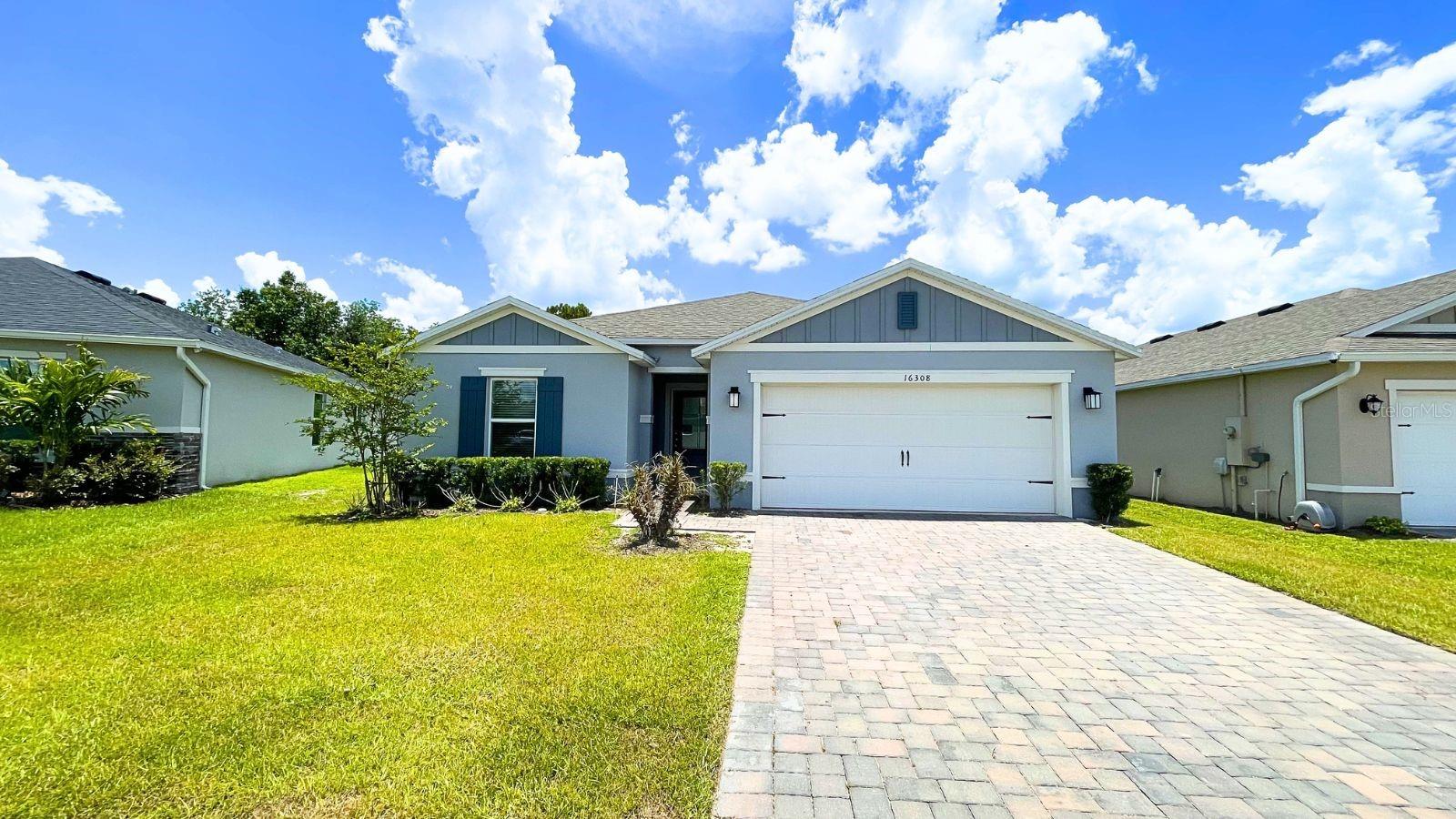 Premium Conservation Lot with No Rear Neighbors! Welcome to this beautiful 4-bedroom, 2-bath home located in the highly desirable Sanctuary community in Clermont. One of the property's most valuable features is its private rear setting, offering peaceful nature views with no rear neighbors and no homes planned directly behind the property. Enjoy added privacy, open green space, and a tranquil backdrop rarely found in today's market. Built in 2022, this move-in ready home features an open-concept floor plan, spacious kitchen, modern finishes, generous primary suite, and plenty of natural light throughout. Conveniently located near shopping, dining, major highways, and Central Florida attractions. Why wait for new construction when you can own this nearly new home today? Schedule your private showing before this opportunity is gone!