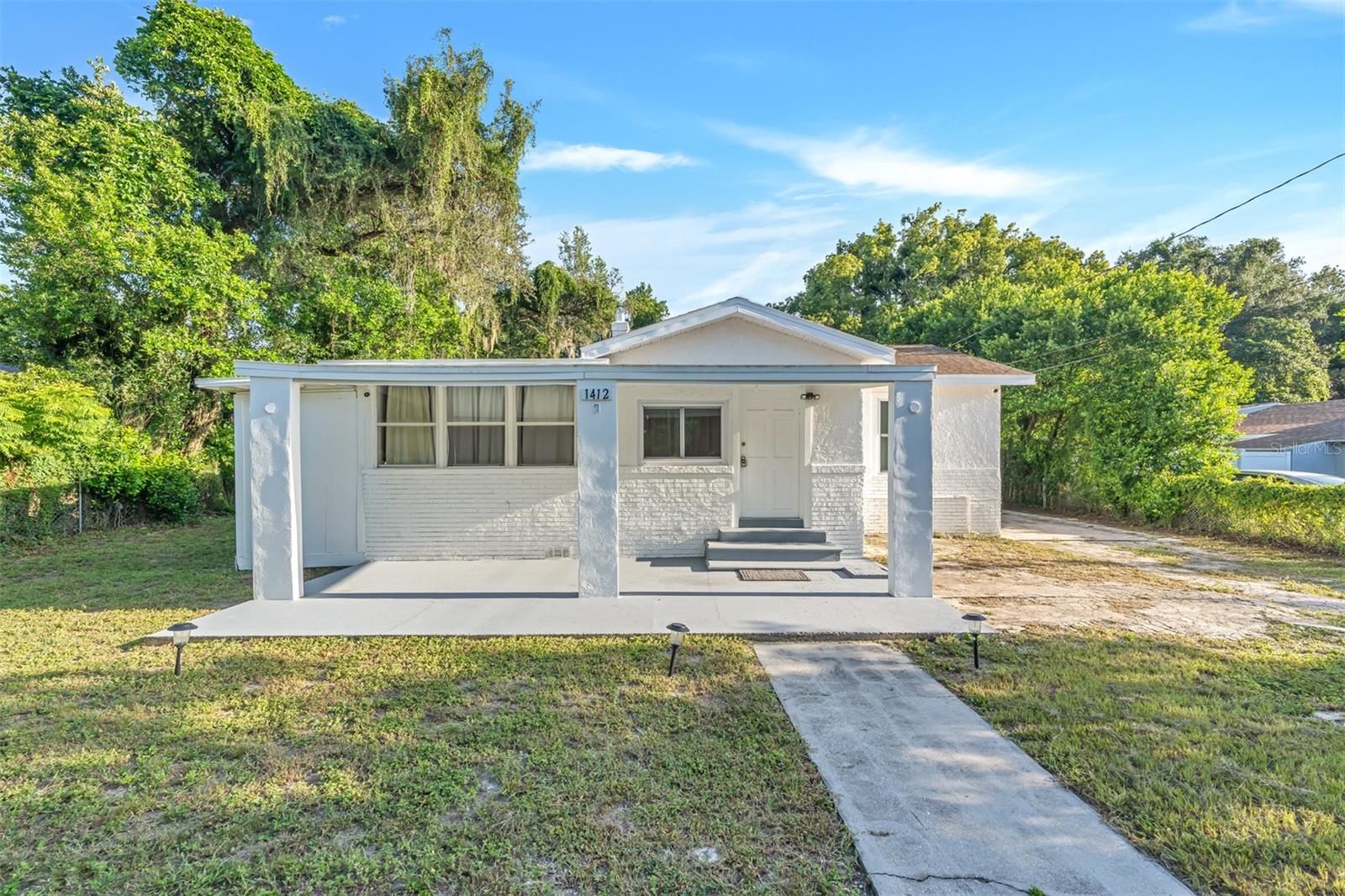 **ACT QUICKLY - Back on the market due to buyer financing falling through, MAJOR PRICE REDUCTION!!!** Welcome to your perfect oasis near Busch Gardens! This renovated gem boasts a split floor plan that offers both privacy and convenience, with the living, dining, and kitchen areas seamlessly flowing together, creating an inviting and spacious atmosphere. The entire home has been thoughtfully upgraded, inside and out, featuring new large-format ceramic tile throughout, an updated kitchen with modern appliances, luxurious bathrooms with designer finishes, and fresh paint that provides a blank canvas for your personal style. The roof, only 5 years old, and the new HVAC system offer peace of mind. Step outside to your private outdoor space, including a large fenced yard, perfect for entertaining or relaxation. This home combines timeless elegance with modern comfort and is conveniently located near Busch Gardens, Adventure Island, shopping, dining, and major highways. Don't miss the opportunity to make this stunning property yours; schedule a private showing today!