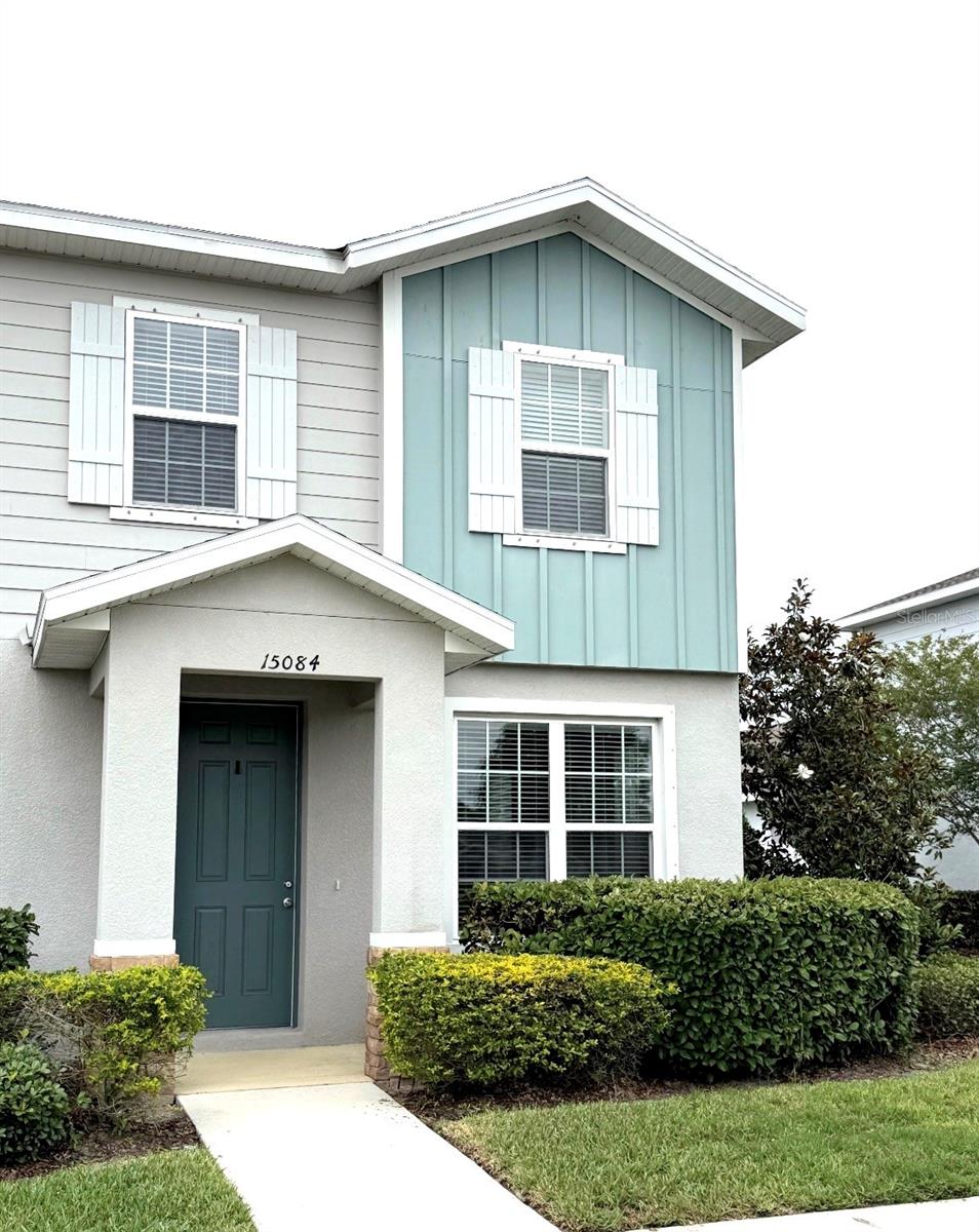 One or more photo(s) has been virtually staged. Welcome to 15084 Caravan Avenue, an end-unit townhome with a detached two-car garage in the highly sought-after Asturia community of Odessa. Located just off the Veterans Expressway in the growing SR 54 corridor, this home offers convenient access to Downtown Tampa, Tampa International Airport, Gulf Coast beaches, shopping, dining, fitness studios, entertainment, and everyday conveniences.

As an end unit, this home benefits from additional windows, abundant natural light, as well as blinds for evening privacy. The open-concept first floor includes the kitchen with upgraded 42-inch cabinetry, granite countertops, a gas range, vented microwave, pantry, LED lighting and a large center island that anchors the kitchen and provides an ideal gathering space. The kitchen overlooks the dining area and a generously sized great room, creating a functional layout for daily living. Additional storage space can be found under the staircase, and a tankless water heater adds efficiency and convenience.  If you are seeking outdoor living space you will enjoy the private courtyard off the kitchen featuring a paver patio and vinyl fencing, creating a private setting for morning coffee, outdoor dining, or entertaining guests. The garage is conveniently accessed directly from the courtyard. On the second floor of the home, upgraded stair railings and balusters lead to the primary suite, which includes a walk-in closet and an en-suite bath with a dual vanity and a walk-in shower. Two additional bedrooms share a full bathroom, and the laundry area is conveniently located on the second floor.

Asturia residents enjoy access to a clubhouse, fitness center, resort-style pool, trails, dog parks, playgrounds, and a calendar of community events throughout the year. The HOA includes exterior maintenance, lawn care, and roof repairs, contributing to a low-stress ownership experience. This property may appeal to first-time buyers, down-sizers, seasonal residents, or anyone looking for a low-maintenance home in a well-connected community.

Seller willing to contribute toward buyer closing costs or interest rate buy-down with acceptable terms, creating an opportunity to reduce upfront expenses and improve monthly affordability.