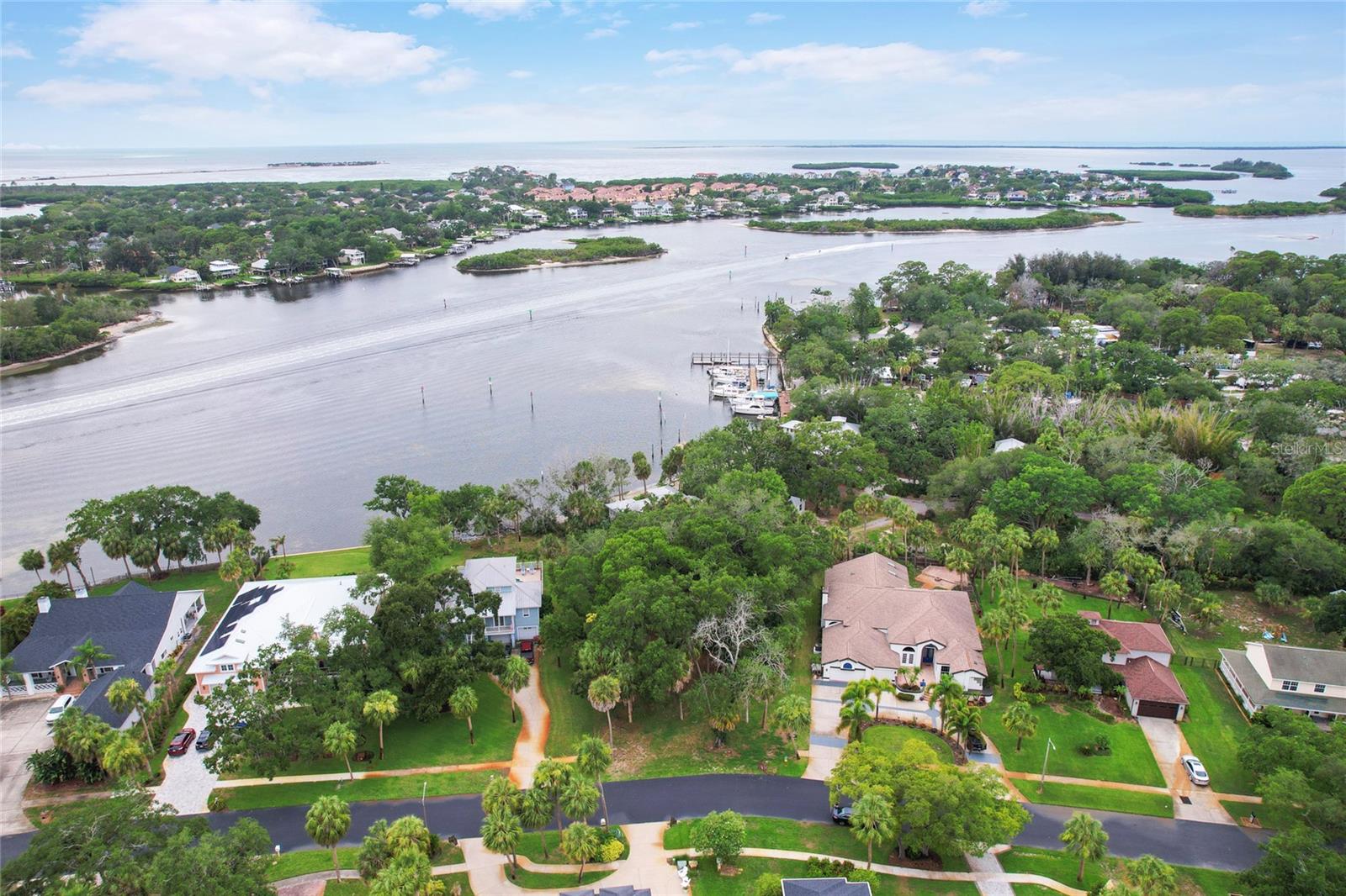AMAZING WATERFONT COMMUNITY of Meyers Cove!!
DOCK WITH 16000 POUND LIFT ALREADY IN PLACE - FITS 30' BOAT
Build your dream custom home with Water Views in this Gated Executive Tarpon Springs Community.  This nearly half acre lot is hard to find yet the perfect canvas for what you can dream up as your future home.  Its a VERY SHORT boat ride down the Anclote River out to open water.  Plus you can take advantage of restaurants on the World Famous Sponge Dock like great restaurants and shopping...All by boat!!  Come tour this private GATED community and plan your next steps.  Happy to refer local Builder as well!