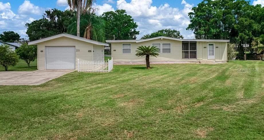 Calling all fishermen, fisherwomen and outdoor enthusiasts! This charming 2-bedroom, 2-bathroom home features a
versatile bonus room—perfect for a third bedroom or home office—and comes fully furnished with everything you need to
start living the lake life today. Situated on 75 feet of prime canal frontage, you have a straight shot out to Lake Istokpoga,
a 27,682-acre haven famed for championship bass fishing. The property is fully equipped for anglers, boasting a dedicated
shiner building. Additional features include an open-air patio perfect for entertaining, Boathouse and a 15x19 exterior
building ideal for a workshop, golf cart, or extra storage, metal roof, new well pump May 2026. Located in Istokpoga
Shores, a golf cart-friendly community with no HOA or deed restrictions, there is plenty of room to bring your toys and
pets. Come enjoy the peace, serenity, magnificent sunrises and sunsets and abundant wildlife of waterfront living at its
finest!