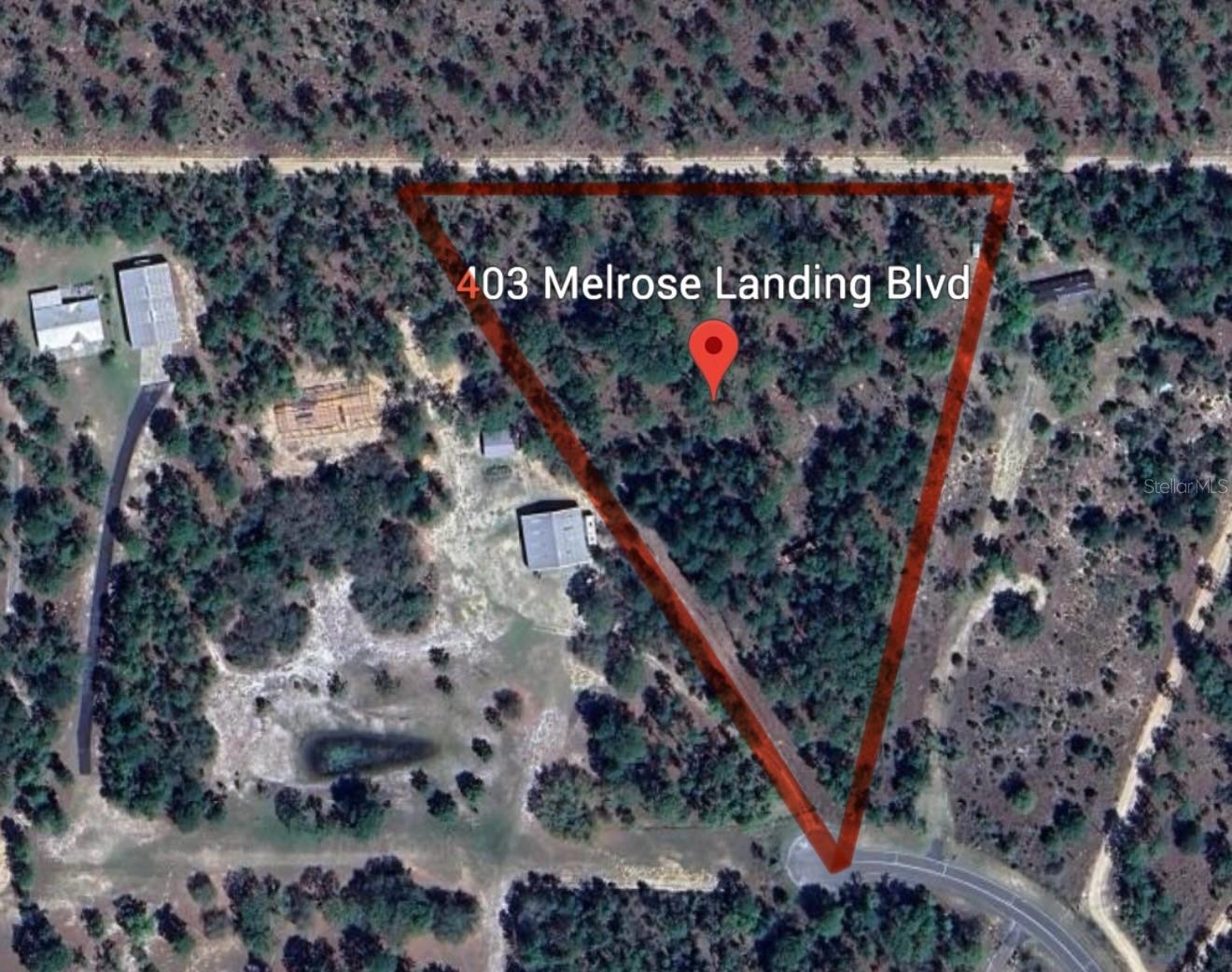 Build your dream home on this spacious 5.22 acre lot in the desirable Melrose Landing community. Property features paved road frontage on a cul-de-sac, a quiet setting, high and dry, flexible zoning, and access to a private airstrip for property owners. Conveniently located near Melrose, Gainesville, and Palatka with easy access to shopping, dining, and recreational lakes. Enjoy the privacy of a rural community with the flexibility to build now or hold for future use.
