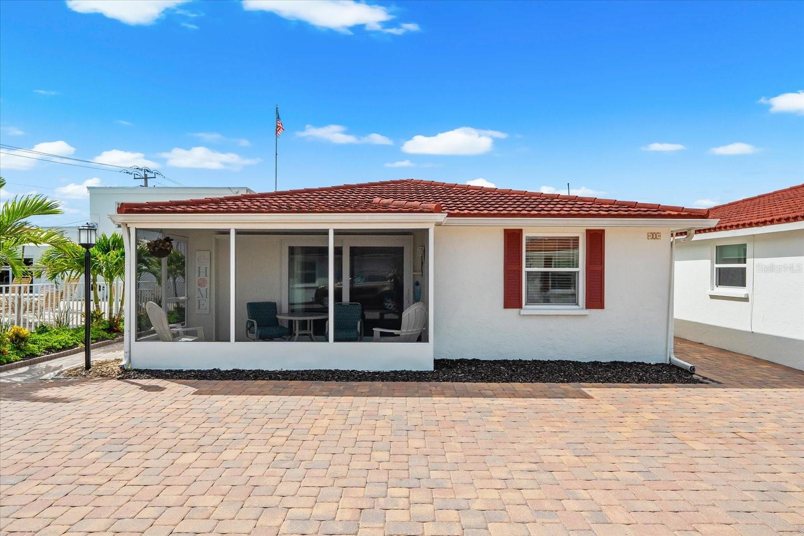 Welcome to Casa Blanca, one of Siesta Key's most sought-after beachfront communities. This beautifully renovated two-bedroom, one-bath villa is ideally located on the Gulf side of Midnight Pass Road, just steps from the world-famous white quartz sands and turquoise waters of Crescent Beach. Situated near Point of Rocks, residents and guests enjoy some of the island's best beach walking, shelling, snorkeling, and breathtaking Gulf sunsets.

Completely remodeled from top to bottom, this move-in-ready villa showcases quality craftsmanship and stylish coastal finishes throughout. Features include impact-rated windows and doors, a stunning updated kitchen with GE appliances and dining area, a beautifully renovated bathroom, tile flooring throughout, and an open, inviting floor plan designed for comfortable island living.

Just a short stroll from the community pool and clubhouse, Casa Blanca offers resort-style amenities in an exceptional beachfront setting. The community's highly desirable 5- to 7-day minimum rental policy provides outstanding income potential, making this property an ideal investment opportunity, vacation retreat, or full-time residence.

Conveniently located near the Siesta Key trolley route, you'll enjoy easy access to Siesta Key Village, Stickney Point, and an abundance of restaurants, shopping, entertainment, and waterfront dining.

Offering the perfect blend of beachfront living, rental flexibility, and island convenience, this turnkey coastal retreat is an exceptional opportunity to experience the very best of Siesta Key.