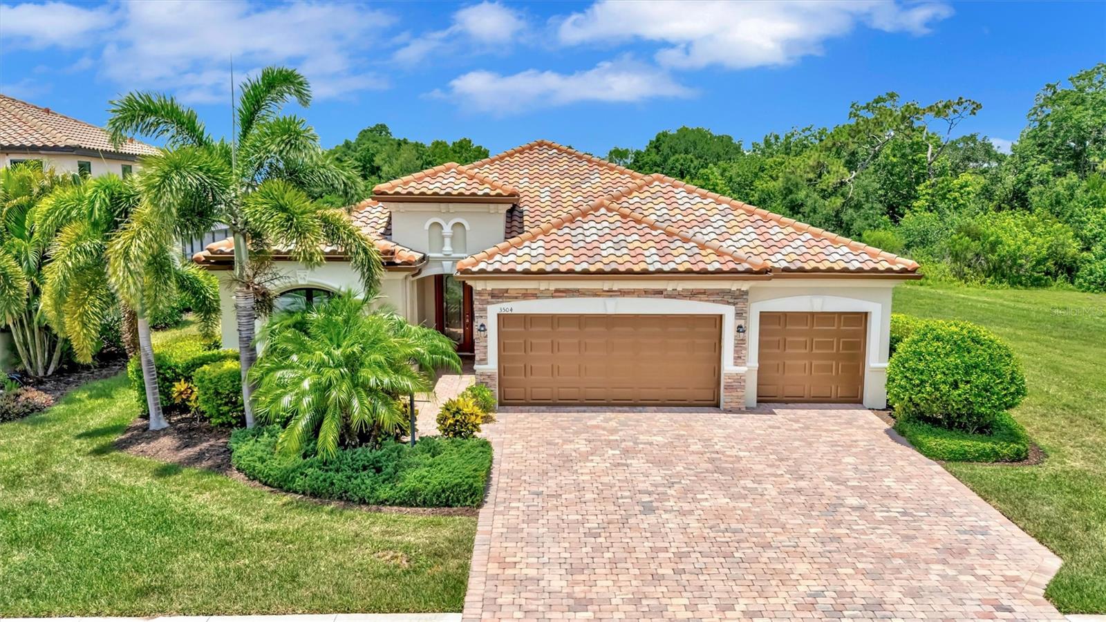 Welcome to Savanna at Lakewood Ranch, where breathtaking lake and preserve views, exceptional privacy, abundant natural light, and thoughtful upgrades create a home that’s truly special. Perfectly positioned on a premium homesite with only one neighboring property, you’ll enjoy the rare advantage of no homes behind, on one side, or directly across from you.

Offering over 2,200 square feet, this 4-bedroom, 2-bath residence features a desirable split-bedroom floor plan with generous living spaces designed for both everyday comfort and entertaining. Large windows and sliding glass doors fill the home with natural light, creating a bright and inviting atmosphere while showcasing the beautiful outdoor views. The spacious great room flows seamlessly into the dining area and breakfast nook, while the centrally located kitchen serves as the heart of the home, keeping everyone connected.

The private primary suite offers lanai access, a walk-in closet, and an en-suite bath. Three additional bedrooms provide flexibility for family, guests, a home office, or hobby space.

Step outside and discover what truly sets this property apart. The screened pool and expansive covered lanai create an incredible outdoor retreat overlooking tranquil lake and preserve views. Whether you’re hosting family gatherings, enjoying a quiet evening swim, or simply relaxing with your morning coffee, this backyard was designed to be enjoyed year-round.

Beyond the beautiful setting, this home offers exceptional peace of mind with a whole-house generator, No need to schlep metal panel Shutters, we have accordion hurricane shutters, a hurricane-impact front window, and an electric roll-down storm screen that protects the lanai. These valuable features provide added security and convenience, eliminating the need to install heavy storm panels when severe weather approaches. Additional improvements include a pool heater (2022), exterior paint (2026), polyaspartic garage floor coating (2026), paver repairs and sealing, gutters, washer (2024), microwave (2025), and meticulous maintenance records available for review.

Located in the amenity-rich community of Savanna, residents enjoy a resort-style clubhouse, community pool, fitness center, dog park, playground, and walking trails, all just minutes from Lakewood Ranch’s shopping, dining, entertainment, parks, and top-rated schools.

With a premium homesite, incredible privacy, abundant natural light, extensive storm protection, and beautiful indoor-outdoor living spaces, this is a home that stands apart from the rest.