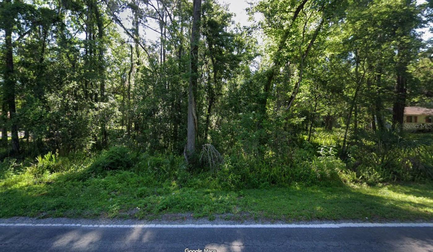 Buildable 0.96-acre (approx.) wooded parcel in a quiet Brooksville setting with flexible residential zoning. This lot offers approximately 150 feet of road frontage and a depth of 300 feet, providing ample space for a site-built home or manufactured home.

Zoned R1A, allowing single-family homes (minimum 900 sq ft) and mobile homes (minimum 600 sq ft), giving buyers multiple options for development. Setbacks include 25 feet front, 10 feet on each side, and 20 feet rear.

Located among existing homes and mobile residences, the property offers a balance of privacy and established surroundings. A large portion of the lot lies in Flood Zone X (higher and buildable area), with Flood Zone A also present — buyer to verify buildability, site planning, and flood requirements.

County water is available, electric service is provided by Withlacoochee River Electric Cooperative, and septic will be required.

Whether you’re looking to build, place a manufactured home, or hold land for future use, this parcel offers space, flexibility, and accessibility in a growing Hernando County area.

Lot dimensions and acreage are approximate. Information provided is deemed reliable but not guaranteed. Buyer to verify exact measurements, boundaries, utilities, and all property details through their own due diligence.