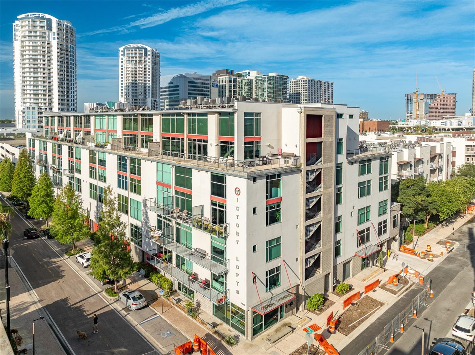 Experience true urban living in the heart of Tampa's Channelside District. This unique corner loft offers 1 bedroom, 2 bathrooms, soaring ceilings, exposed concrete finishes, and oversized windows that flood the home with natural light while showcasing views of Channelside and the cruise ships as they arrive in port.

The open concept living space features a modern kitchen, spacious living area, and an industrial design that gives the home character you won't find in a typical condo. Upstairs, the loft style primary suite overlooks the main living space, creating a bright and open feel throughout.

One of the standout features of this condo is the rare combination of two designated parking spaces, a private storage unit, and two full bathroom - amenities that are hard to find in downtown living.

Victory Lofts also offers a resident fitness center, and you're just steps from some of Tampa's best restaurants, coffee shops, bars, Water Street, Sparkman Wharf, Benchmark International Arena, the Tampa Riverwalk, and everything the Channel District has to offer. Whether you're looking for a full-time residence, second home, or lock and leave city retreat, this loft delivers the perfect combination of style, convenience, and location.