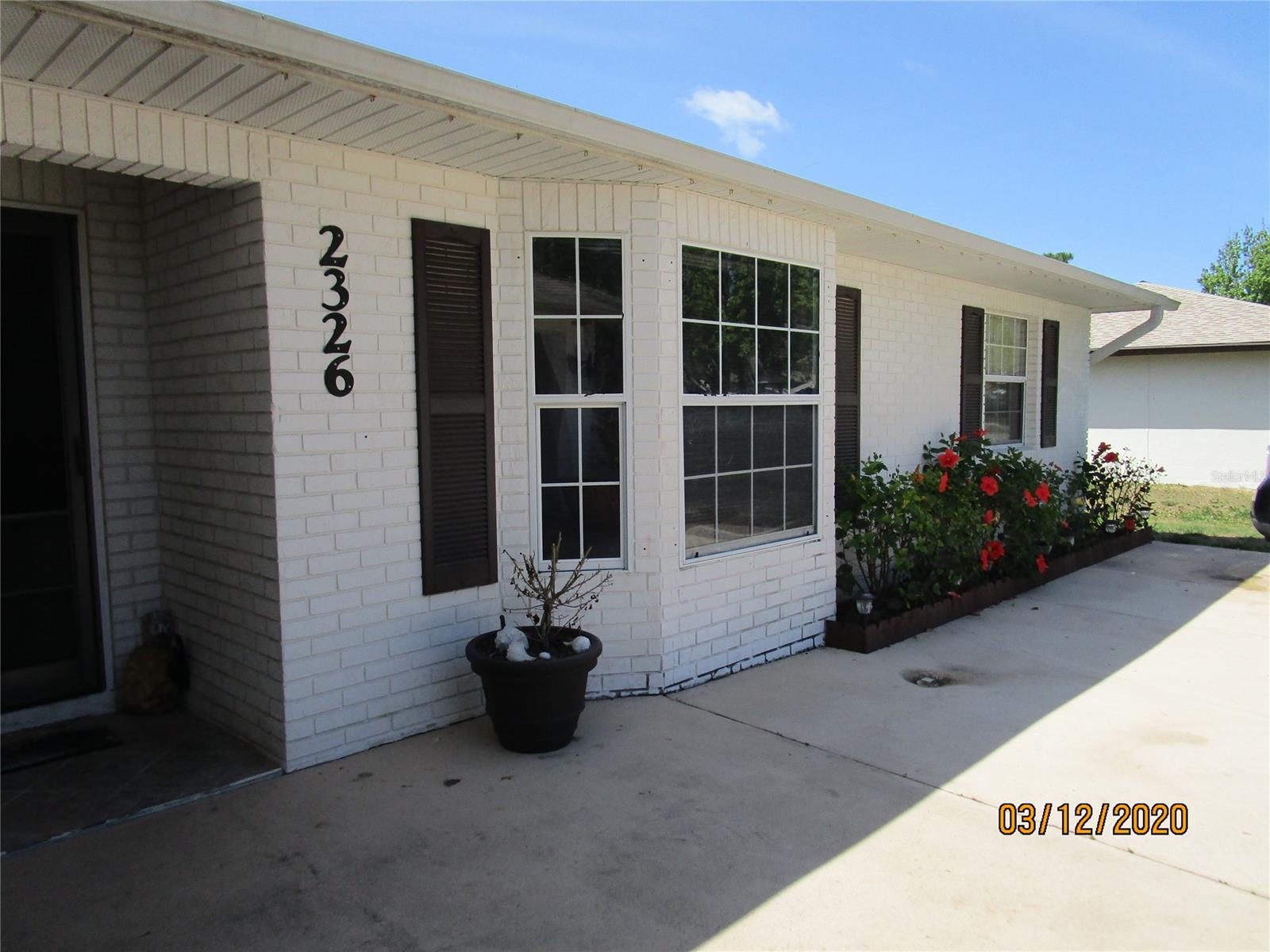 Open floor plan 3 bedroom 2 bath block pool home located in Florida Shores.  Entering the home you will feel the spaciousness of the great room, kitchen and dining.  The home has tile floors, wood cabinets, stainless appliances, granite counter tops, updated light fixtures and ceiling fans.  Kitchen offers large breakfast bar/island and breakfast nook area for small table.  The dining area has ample room for large table or could be used as a family room that leads out onto the screened porch.  Step outside and enjoy your own private pool with concrete pool deck and waterfall.  Backyard is privacy fenced and also has small shed that is great for extra storage space.  This block home with a double car garage and large driveway make for a great family home.  Only minutes to New Smyrna Beach, river, beach, shopping and schools. ;Water: City