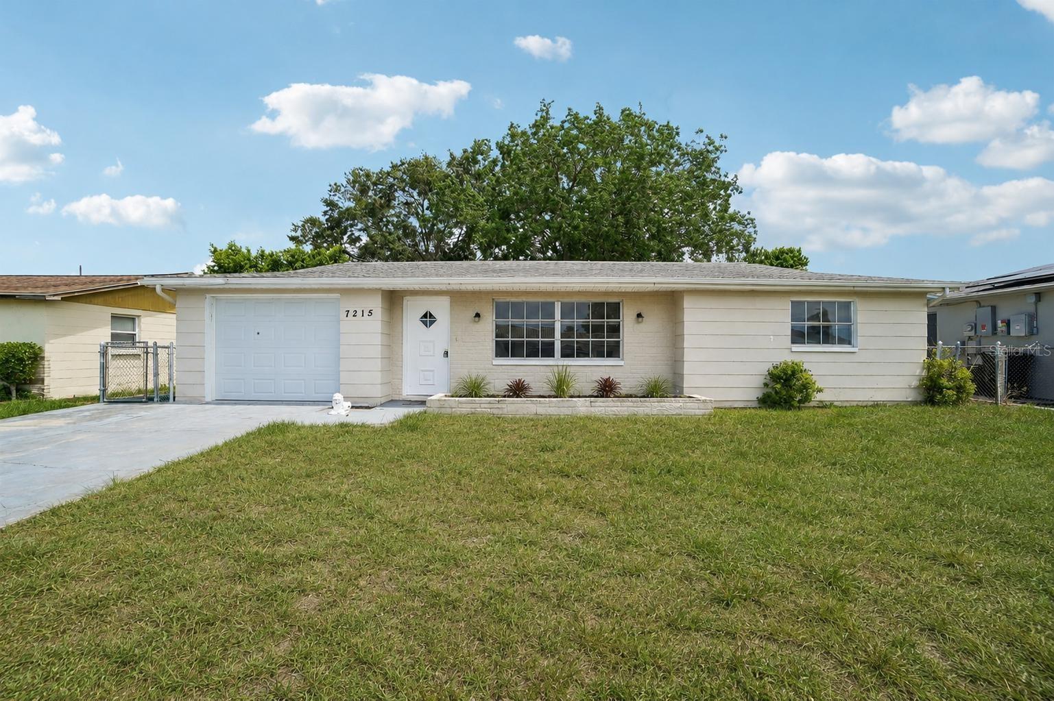 Move-in ready and full of value! This updated 3-bedroom, 2-bath home with a 1-car garage offers an affordable opportunity for first-time buyers, investors, or anyone looking for a well-maintained home at a great price. The home features an updated kitchen and remodeled bathrooms, giving it a modern feel while still remaining budget friendly. Recent improvements include Luxury Vinyl Plank (LVP) flooring installed throughout the home in May 2026, roof (2014), HVAC system (2019), and electrical upgrades completed in 2019, providing added peace of mind for years to come. Located outside of a designated flood zone, no flood insurance is required. Conveniently situated near US Highway 19, you'll enjoy quick access to shopping, restaurants, entertainment, parks, and everyday conveniences. With its functional layout, numerous updates, and attractive price point for the size, this property stands out in today's market. Previously used as a long-term rental property, this home also offers strong investment potential for buyers looking to add an income-producing property to their portfolio. Whether you're searching for your first home or your next investment opportunity, this property is a must-see. Schedule your private showing today before it's gone!