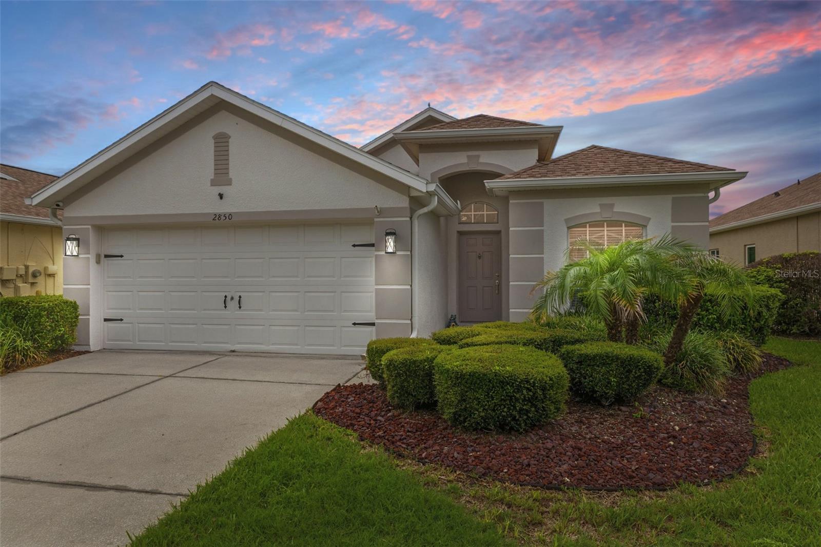 Step into this beautifully updated 3 bedroom, 2 bath home in the gated Plantation Palms golf community, offering 1,923 square feet of stylish, low-maintenance living. Wood-look tile flooring flows throughout the home, with crown molding and blinds on almost every window adding a polished, custom feel.

The renovated kitchen is a true centerpiece, featuring rich cabinetry, sleek granite countertops, and modern finishes that make everyday cooking and entertaining a pleasure. Just off the main living area, a large Florida room provides flexible extra living space and is cooled efficiently by a dedicated mini-split system—ideal as a second family room, game room, or indoor-outdoor entertaining area.

The primary suite stands out with an incredible, spa-like master bathroom renovation, showcasing updated countertops, fixtures, and thoughtful design details. Two additional bedrooms and a second full bath offer comfortable space for family, guests, or a home office.

A newer roof was installed in 2020 and is covered under the HOA fee, both AC units were replaced in 2021 for peace of mind and energy efficiency. Living in Plantation Palms, residents enjoy a community pool, tennis courts, an 18-hole golf course, lighted driving range, and an 18-hole mini-golf course, along with an on-site pub/restaurant—delivering a true golf-community lifestyle just minutes from shopping, dining, and major commuter routes.