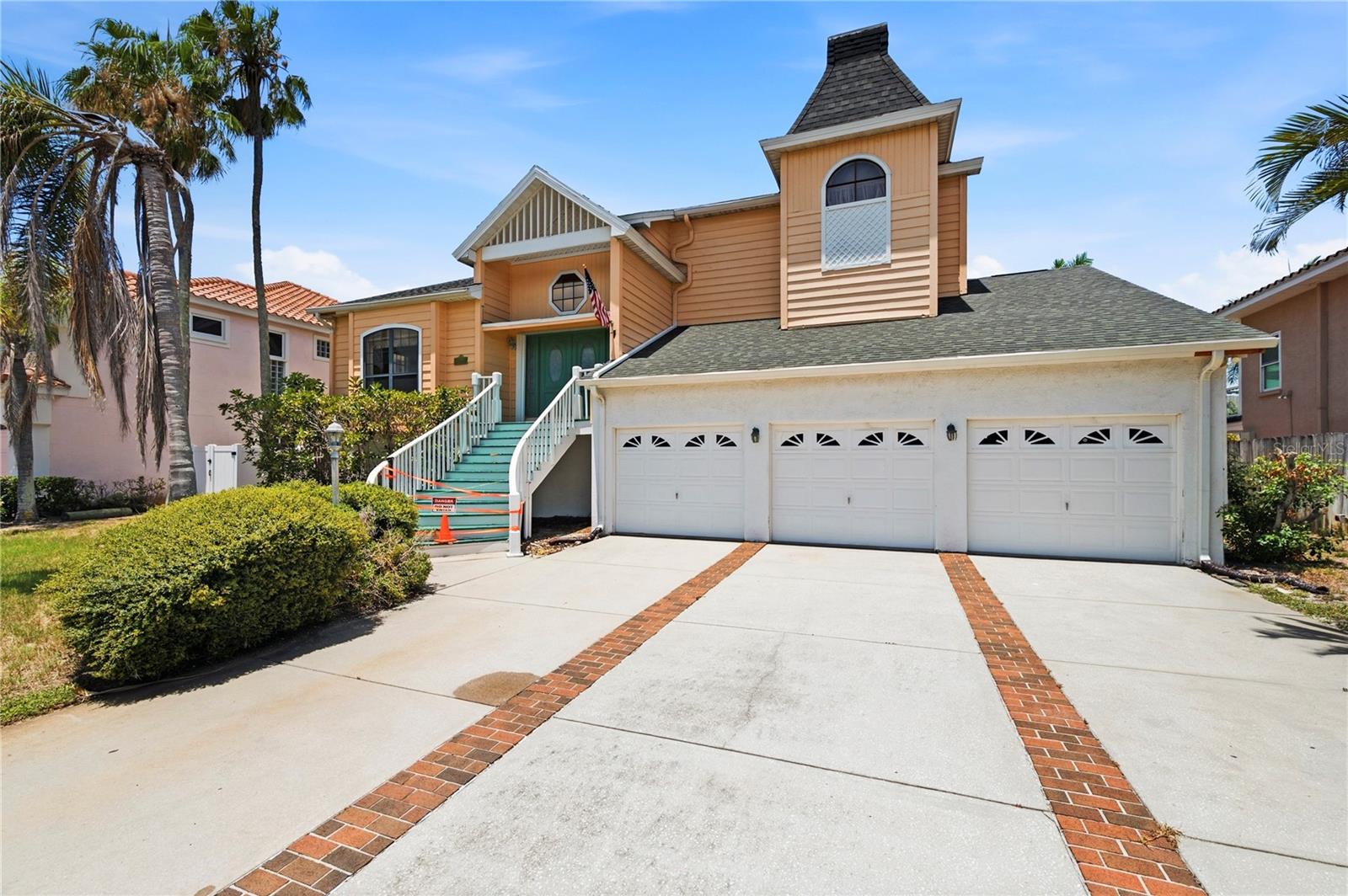 VALUE-VALUE-VALUE- Best single family home value in Terra Verde, (Sand Pines Community).
This 3,688 sq ft. 4 bebroom / 3 bath / 3 car garage, (large shop area) home including an office with built in desk and cabinets.
Vaulted ceilings, large rooms, tons of closets and storage space. Kitchen was remodeled in 2001, nice wood cabinetry and hard surface countertops. Roof replaced in 2025,  A/C replaced in 2024,  and pool pump replaced in 2024...  Minimal garage drywall  flood / storm damage.
Large inground pool and pool deck and dockage for a 60 ft boat. Storm window accordion roll downs and panels for all windows and doors.
Please note: carpets have been removed and interior is original needing some minor TLC, such as interior paint and kitchen appliance updates.
Front staircase raiings  also need repair.
This is an incredible buy at this price point and location!
Don't let this  waterfront gem get away !!