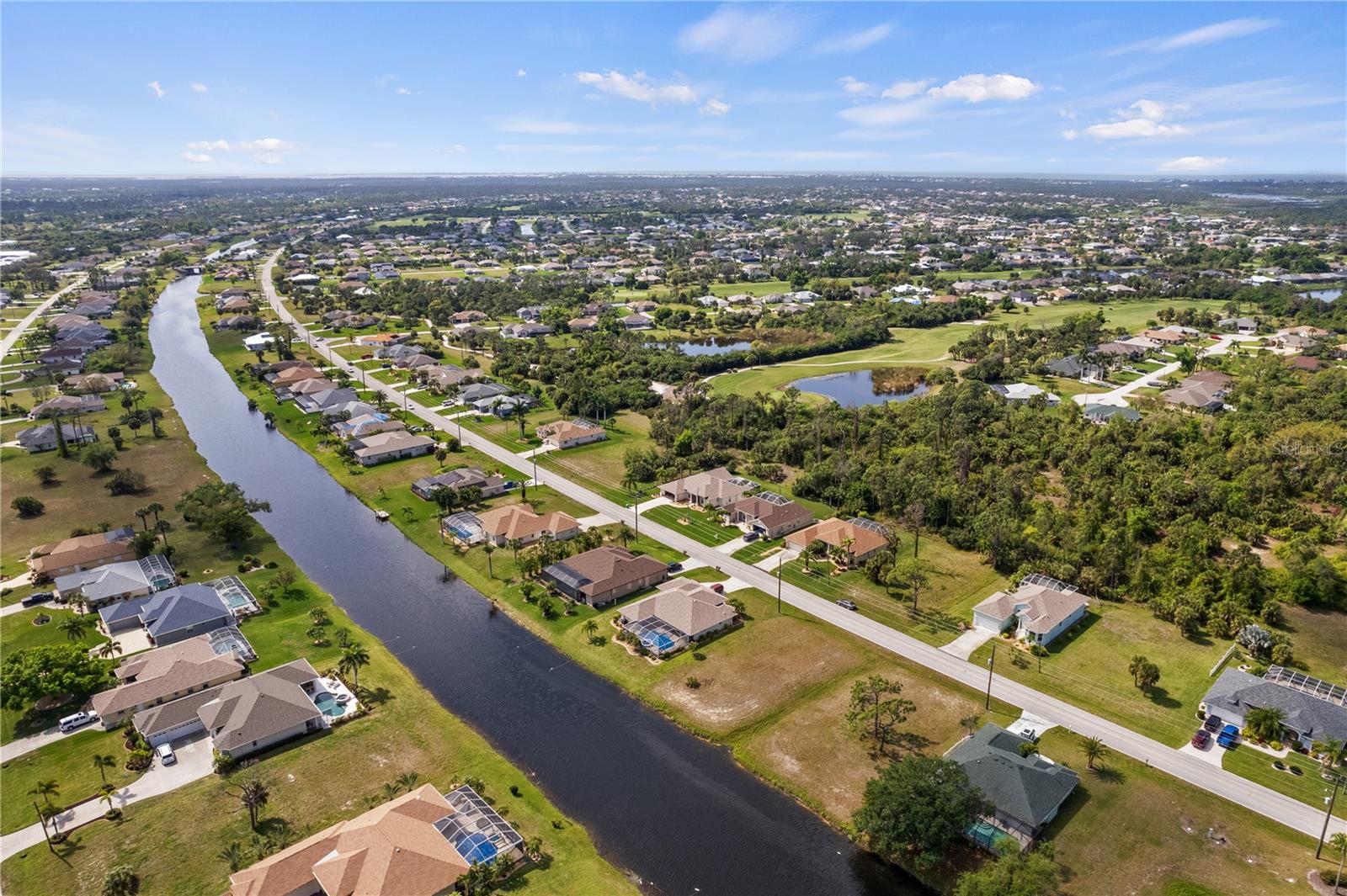 **NO SCRUB JAY ZONE*** WATERFRONT LOT ***GOLF COMMUNITY 15 MINS FROM BEACH ***WIDE CANAL***ROTONDA BUILDABLE WATER FRONT LOT PRICED TO SELL! Buy this lot and build YOUR dream home in the established neighborhood of Long Meadow in fabulous Rotonda . Enjoy sunrises daily, that will sparkle across the Rotonda River. Rotonda West has 5 golf courses, tennis, a park, and many walking trails, and is conveniently located near the Charlotte County Sports Complex hosting many pre-season professional baseball games, shopping, restaurants, and the world famous beaches of Englewood Beach, Manasota Key and Boca Grande. If that is not enough to entice you, in addition to all of the activities available within the community, world-class fishing and internationally acclaimed beaches are also nearby. Experience the beauty of Southwest Florida and everything it has to offer. The PLAT OF SURVEY is available.