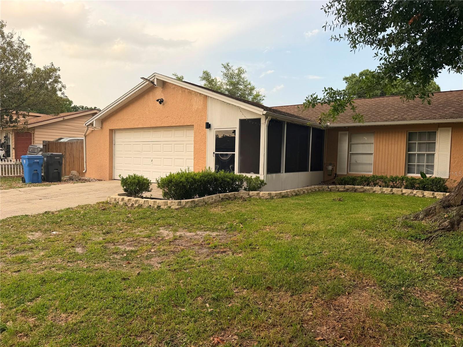 This beautifully upgraded 1,386-square-foot Brandon/Valrico 3-bedroom, 2-bathroom single-family residence offers incredible value in a sought-after community with absolutely NO HOA or CDD fees. Situated in FEMA flood zone X (minimal flood risk) on a spacious 8,100-square-foot lot, it is packed with premium enhancements. Inside, the welcoming entry boasts a front enclosed patio and decorative mudroom leading into a spacious living room and a cozy dining area with built-in bench storage. The gourmet kitchen shines with granite countertops, 41-inch solid wood cabinets (freshly painted 2024) and stainless steel appliances. More upgrades include freshly painted bathroom cabinets and tub refresh (December 2024), a garage ceiling update (December 2024), a built-in laundry room desk (June 2025), sleek living and dining room flooring (June 2025), and a gorgeous back patio pergola (May 2026). Retreat to the private primary suite featuring an en-suite bathroom with a granite vanity and a custom-tiled shower, situated right next to the second bedroom, with a third bedroom and second full bath just down the hall. Perfectly positioned just 30 minutes from Tampa International Airport and under an hour from Clearwater Beach, this highly accessible home is exceptionally close to premier local shopping, dining, and community attractions.