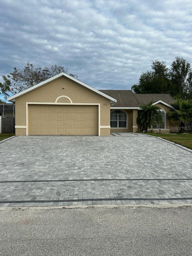 Welcome to this beautifully updated home featuring thoughtful upgrades designed for both comfort and functionality. The extended driveway provides additional parking space, making it ideal for multiple vehicles and guests. Inside, you'll find 3 bedrooms with walk in closets, a fully remodeled kitchen with modern finishesand stainless steel appliances along with two beautifully renovated bathrooms that add a fresh, contemporary feel throughout the home. The open and inviting layout is complemented by durable flooring and abundant natural light.
Step outside to enjoy the screened pool area, where the enclosure has been expanded to create a larger outdoor living space—perfect for entertaining, relaxing, or enjoying Florida's year-round sunshine.