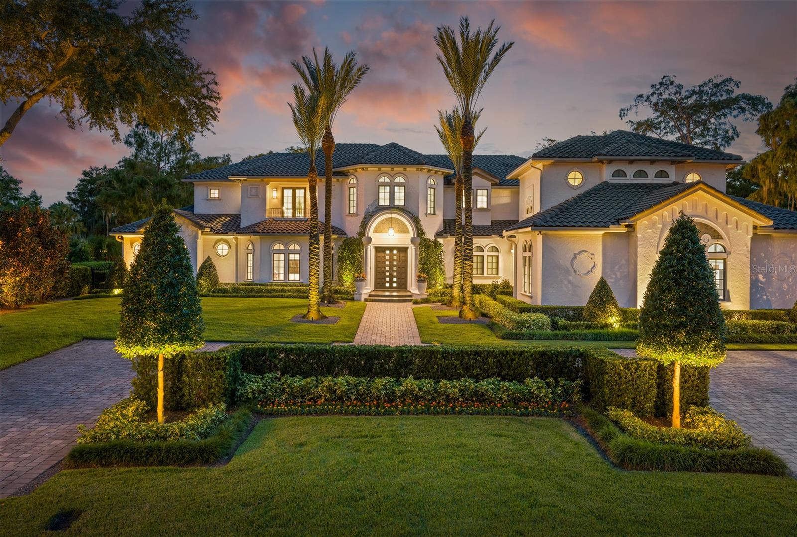 Majestic lakefront estate fully renovated in 2021 located in the beautiful Winter Park, Florida.

Nestled on sprawling acreage, this breathtaking 6-bedroom, 7.5 bathroom lakefront mansion offers unparalleled luxury and serenity in the heart of Winter Park, Florida. Perched on 220 feet of picturesque Lake Maitland, this stunning estate boasts:

Panoramic views of Lake Maitland, framed by floor-to-ceiling windows and electrically operated pocket sliding glass doors. Expansive outdoor oasis featuring a 70 foot resort-style pool, fully stocked outdoor kitchen with big screen television perfect for sunset gatherings. Secluded and private surroundings including multiple different areas with outdoor fireplaces for friends and family to gather ensuring tranquility and exclusivity. 

Grand foyer with soaring ceilings and elegant chandelier creates the framing for the stunning views upon entry. The Gourmet kitchen with top-of-the-line Miele appliances and expansive center island make up every chefs dream. Spacious bedrooms all with en-suite bathrooms and walk-in closets and a stunning Private master retreat with lake-facing balcony. 

Other impressive amenities include both a stunningly presented billiards room as well as a finely appointed theatre room for family members to gather. The property also has its own separately accessed 1 bedroom apartment beautifully finished for those long standing guests. 

Enjoy resort-style living, minutes from Winter Park's charming parks, boutiques, and restaurants. 

Escape to a world of luxury, where every day feels like a vacation. Schedule a private viewing and experience the ultimate Winter Park lifestyle.