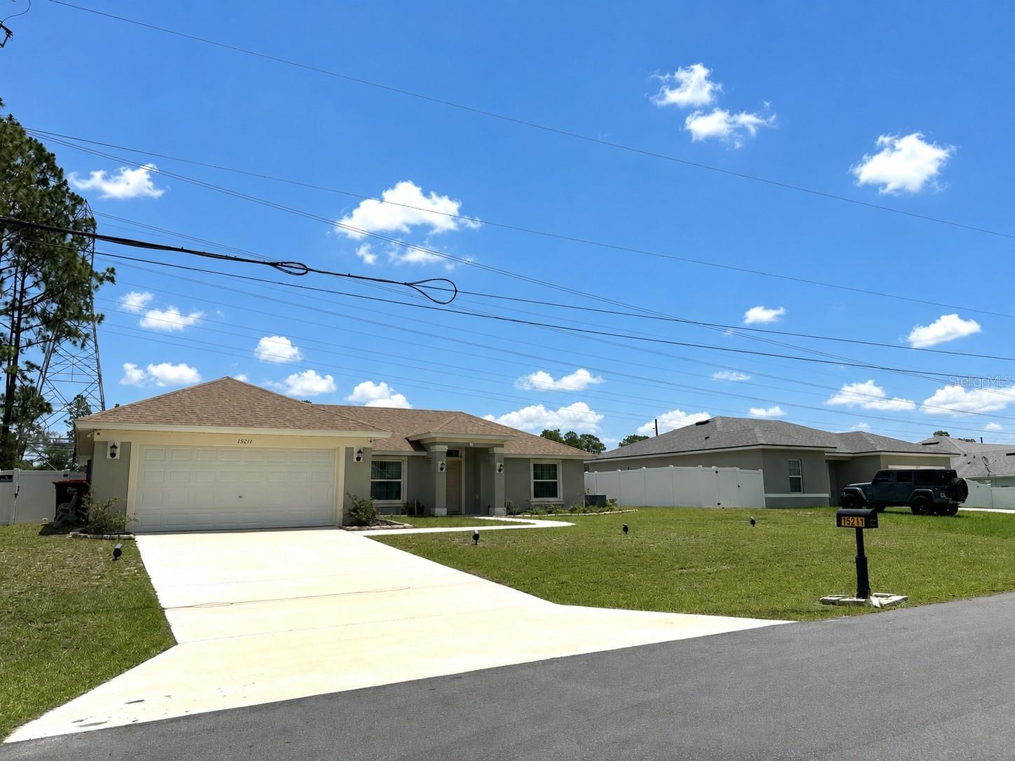 This almost new 2023 home is perfect for buyers seeking a newer build without the wait located. Their is NO HOA and it is Move In Ready!
This beautifully maintained 3-bedroom, 2-bath, 2-car garage modern style home features a bright and open-concept layout designed for today’s lifestyle  with comfort and convenience. 
The open concept is ideal space for entertaining family and friends or enjoying everyday living. The spacious kitchen has a huge island, granite countertops, wood cabinets, stainless steel appliances and is adjacent to the great room and dining area.
The split-bedroom floor plan provides privacy. The primary suite has a walk-in closet and ensuite bathroom with double sinks, a  soaking tub and a separate shower while two additional bedrooms ideal for guests, a home office, or hobbies.
Enjoy added peace of mind with modern upgrades including security cameras, and a sprinkler irrigation system. The fully fenced vinyl backyard offers privacy and space for outdoor enjoyment, pets, or future enhancements.
This home combines freedom, functionality, and value. The patio and outdoor space make it easy to enjoy Florida living year-round.
Conveniently located near shopping, restaurants, medical facilities, and major highways. This beautiful home offers comfort, space, upgrades, and exceptional value all in one! 

Great home as a primary residence or as a seasonal property - also a fantastic opportunity for Investors as there are NO rental restrictions - can rent Airbnb, short-term, and/or long-term. 

Enjoy access to the World Equestrian Center, Hospitals, Medical Professionals, Theaters, Highways, Downtown Ocala, Restaurants, Entertainment, Grocery Stores, Shopping... Ocala/Marion County is officially named the "Horse Capital of the World®", a testament to the County's unique involvement in all things equestrian and its record of producing some of the finest champions.