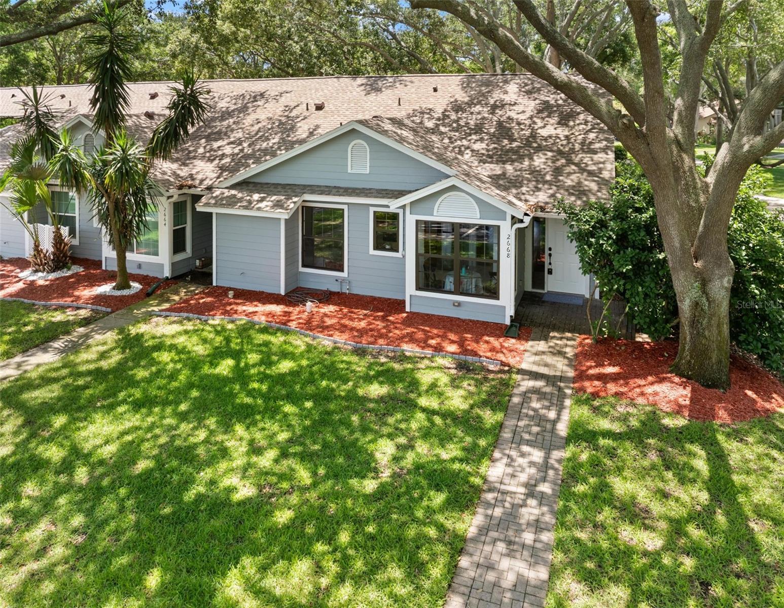 Location, Location, Location and pet friendly. Spacious and inviting 2-bedroom 2-bath villa located in the highly desirable community of Palm Harbor! This stunning large end unit,  well designed home offers an open and comfortable layout with generous living space, abundant natural light, and a functional floor plan perfect for everyday living or seasonal enjoyment. The roomy primary suite features a private full bath while the second bedroom is Roomy. Large closed in Screen porch is a sanctuary for private relaxation. Nice on premise inside storage. Top desirable schools Highland Lakes Elementary, Carwise Middle and Palm Harbor University High. Pool and Tennis courts. 2 assigned parking spaces one is a large carport.
Enjoy the low maintenance free living in a beautifully kept neighborhood with attractive surroundings with convenient access to Publix shopping, dinning, beaches parks, top-rated amenities pool and tennis courts. Home Owners Association includes water. sewer and cable.
Freshly painted, Roof 2024, AC  2011 , water heater 2026 . A wonderful opportunity to enjoy Florida lifestyle in a great location.