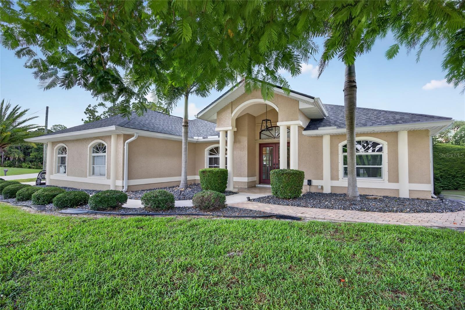 SPACIOUS LIVING, MODERN UPDATES, AND OUTDOOR ENTERTAINING ON AN OVERSIZED CORNER LOT! Welcome to this beautifully maintained 3 BEDROOM, 2 BATHROOM, 2 CAR GARAGE HOME situated on a generous 0.33-ACRE CORNER LOT in the growing community of North Port. Offering a spacious floor plan, major system updates, and an exceptional backyard, this move-in-ready home is the perfect blend of comfort, functionality, and Florida living.

Step inside to discover an open and inviting layout highlighted by VAULTED CEILINGS, abundant natural light, and durable PORCELAIN TILE FLOORING throughout the home. The spacious living area provides the perfect place to gather, while the adjoining kitchen features ample cabinetry, generous counter space, and a breakfast bar ideal for casual dining. An additional flex space adjacent to the kitchen offers endless possibilities as a formal dining area, sitting room, or home office.

The desirable SPLIT-BEDROOM FLOOR PLAN provides privacy for both owners and guests. The spacious primary suite features a WALK-IN CLOSET, direct access to the outdoor living area through FRENCH DOORS, and a beautifully updated ensuite bathroom. Two additional bedrooms and a full guest bathroom provide comfortable accommodations for family and visitors.

Step outside to your own private backyard retreat. The FULLY FENCED YARD offers both privacy and plenty of room to enjoy the outdoors, while the expansive patio is designed for entertaining. Complete with an OUTDOOR KITCHEN, HOT TUB, and ample space for relaxing or hosting family and friends, this outdoor living area truly embraces the Florida lifestyle. A STORAGE SHED provides additional space for lawn equipment, tools, or recreational gear.

This home also offers an impressive list of recent updates, including a NEW ROOF (2026), NEW SEPTIC SYSTEM (2026), NEW ELECTRICAL PANEL (2026), A/C REPLACED IN 2023, WATER HEATER REPLACED IN 2022, FRESH INTERIOR AND EXTERIOR PAINT, and a HURRICANE-IMPACT GARAGE DOOR. HURRICANE SHUTTERS provide additional peace of mind during storm season.

Conveniently located near I-75, shopping, dining, schools, parks, and Gulf Coast beaches, this home offers easy access to everything North Port and the surrounding areas have to offer.

WITH MAJOR UPDATES ALREADY COMPLETED, AN OVERSIZED CORNER LOT, AND AN INCREDIBLE BACKYARD DESIGNED FOR ENTERTAINING, THIS MOVE-IN-READY HOME IS AN OPPORTUNITY YOU WON'T WANT TO MISS!