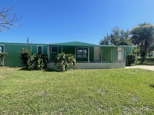 This is a great property with flexibility. You can use it for 2 rentals or an home with an in-law/ student suite. The studio has a private entrance, a kitchen and a private bathroom with walk-in shower. There is a large closet the home has new laminate flooring, new bathrooms with walk-in showers. the main house has a porch  area that will be rescreened. This is a perfect space for adult children, or parents that need a little supervision with their privacy.