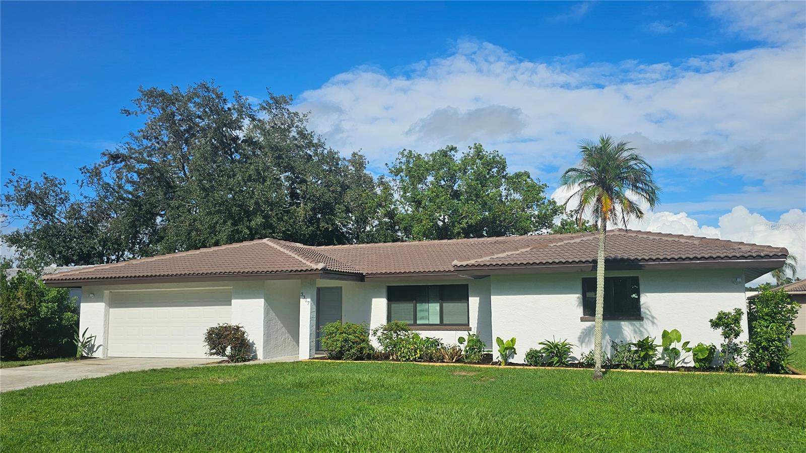 REMODELED SPACIOUS OPEN FLOOR PLAN IN FOREST LAKES COUNTRY CLUB CLOSE TO GOLF COURSE THIS CLASSIC FEATURES A NEW KITCHEN WITH A TON OF SHAKER CABINETS AND QUARTZ COUNTER TOPS. ALL NEW STAINLESS APPLIANCES INCLUDING A KITCHENAIDE FRENCH DRAWER REFRIGERATOR.THE REMODEL INCLUDED NEW HURRICANE RATED WINDOWS THROUGHOUT AND A NEW BARREL TILE ROOF. THE INTERIOR IS FRESHLY PAINTED AND HAS ALL NEW DOORS. THE FLOORS FEATURE A MODERN WOODLIKE LAMINATE WHICH GIVES THE INTERIOR A WARM COZY FEEL. BATHROOMS WERE UPDATED WITHOUT NEW VANITIES SHOWER TILE AND STYLISH ARMITAGE AQUA FIXTURES. THE INTERIOR HAS MANY 54" CASA SALERNO CEILING FANS. HUGE FAMILY ROOM WITH FIVE PICTURES WINDOWS OVER LOOKING A SHADY BACKYARD BRINGS A TOUCH OF NATURE INSIDE.THIS EKEGANT HOME ALSO FEATURES A NEW TANKLESS HOT WATER HEATER, NEW LANDSCAPING BEDS, MYRAID OF CLOSET SPACE AND FRESHLY PAINTED EXTERIOR. THE ONLY THING MISSING IS YOU AND YOUR FRUNITURE!!