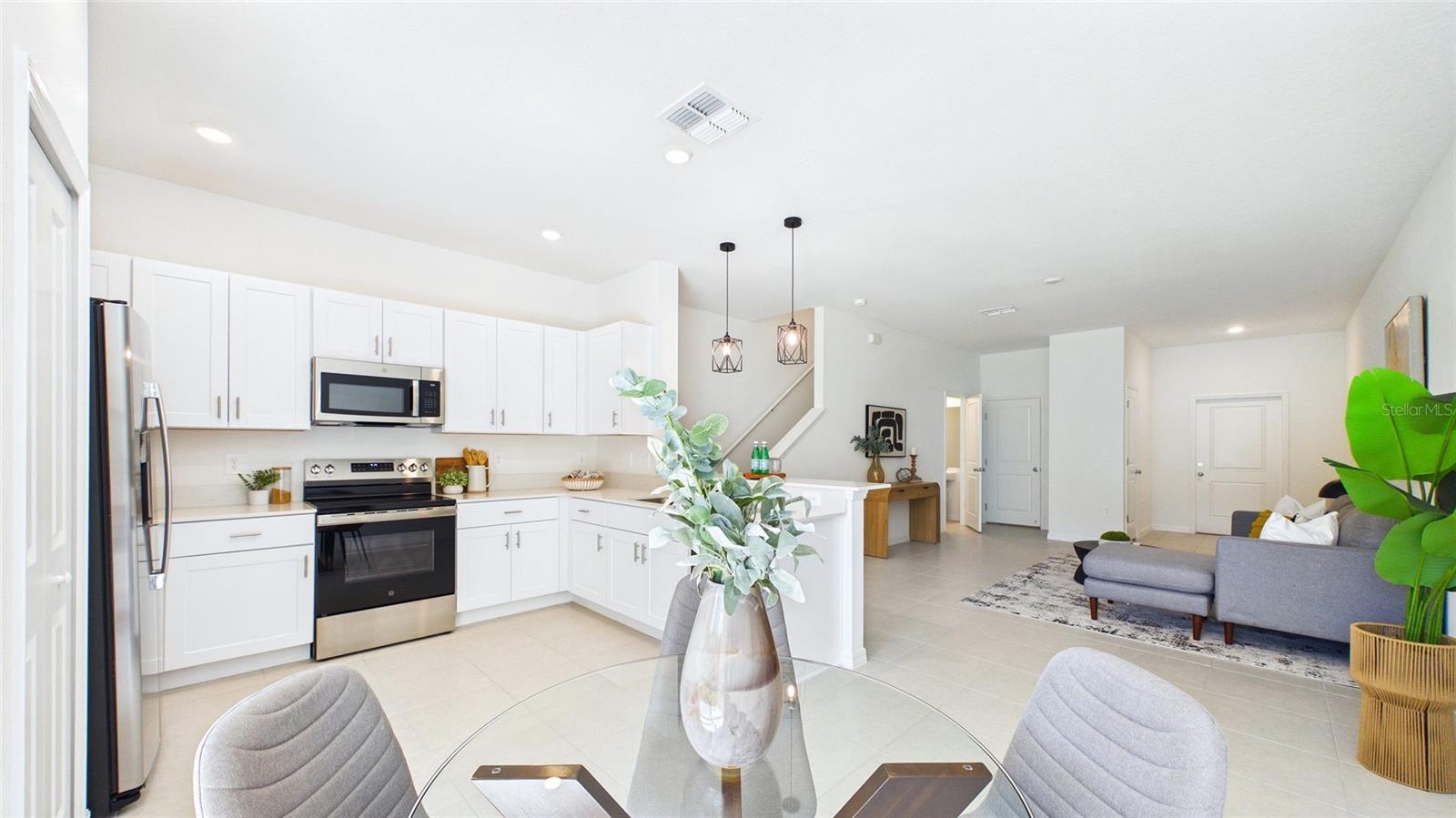 Investor Special! This property may qualify for DSCR financing, making it an excellent opportunity for investors seeking a strong rental property addition to their portfolio. Seller is willing to offer a $5,000 credit toward buyer's prepaids and closing costs with a full-price offer. Brand-new 2025-built townhome offering 1,634 square feet of living space. This 3-bedroom, 2.5-bath residence features an open-concept floor plan with high ceilings, ceramic tile flooring, and quartz countertops throughout. The kitchen includes stainless steel appliances, including a refrigerator, range, microwave, and dishwasher, along with an in-unit washer and dryer. The spacious primary suite features a walk-in closet and private en-suite bath. Additional highlights include a covered rear patio overlooking a pond, a 1-car garage, driveway parking, hurricane shutters, and access to a community pool.

Conveniently located with easy access to Interstate 75 and U.S. Highway 41, providing connectivity to Tampa, Bradenton, and Sarasota. Nearby amenities include shopping, dining, parks, and medical facilities, including St. Joseph's Hospital South.

Whether you're searching for a primary residence or an investment property, this move-in-ready townhome offers modern construction, low-maintenance living, and excellent rental potential.