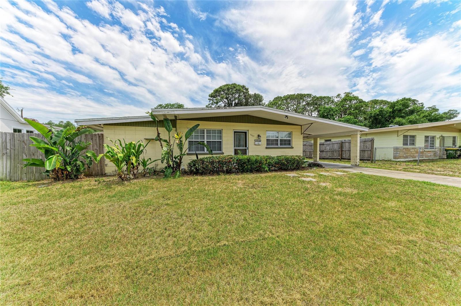 A Rare Find in the Heart of Sarasota — Two Homes, One Exceptional Opportunity In a city where inventory is tight and opportunities like this surface only once in a while, this dual-unit property stands apart. Whether you're an investor chasing cash flow, a family seeking connected-but-separate living, or a homeowner looking to let rental income offset your mortgage — this is the one. The Main Home is warm and welcoming, with two bedrooms, a full bath, and a den that adapts to whatever life demands — home office, reading room, guest space. The eat-in kitchen keeps things bright and functional, and the screened lanai is your front-row seat to everything that makes Florida living worth it. A covered carport, plus shared laundry just steps away, keeps daily life effortless. The Rear Dwelling operates as a fully independent two-story residence — its own driveway, its own entrance, its own world. Two bedrooms, one bath, and a smart layout split across two floors give tenants or family members the privacy they want without sacrificing connection to you. And when you're not relaxing on the lanai? You're minutes from Sarasota's celebrated dining and arts scene, the Legacy Trail, and some of the most beautiful beaches on the Gulf Coast — Siesta Key, Lido Key, all within easy reach. Extra storage on site fits a boat, trailer, or RV. Because why not? Two units. Endless possibilities. One showing to change everything.