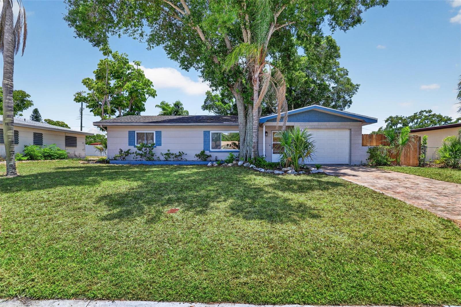STOP SCROLLING. THIS IS THE OPPORTUNITY.

Solid block construction. Two bedrooms. Two bathrooms. One-car garage. Terrazzo floors. Large, fenced backyard. Covered patio. Great location.

The ingredients are all here.

This isn't a house pretending to be something it's not. It's a blank canvas waiting for the next owner to roll up their sleeves and bring it back to life. Whether you're an investor, first-time buyer, downsizer, or someone looking for a project with real upside, this is the kind of opportunity that doesn't come around every day.

Even better, this home has been loved and cared for by the same owner since 1970. That's more than five decades of ownership—a rarity in today's market and a testament to just how much this home has meant to its owner over the years.

The backyard is a pleasant surprise—large, private, fenced, and surrounded by mature tropical landscaping. There's plenty of room to entertain, garden, let the dogs run, or simply enjoy the Florida weather from the covered patio.

And let's talk location. Close to the beaches. Close to shopping. Close to restaurants. Close to just about everything.

In a market where so many homes are overpriced or overcomplicated, this one is refreshingly simple: good bones, a great lot, and unlimited potential.

Don't overthink this one. Somebody is going to buy it, put in the work, and end up with something special. The only question is whether you'll be the one wishing you had.