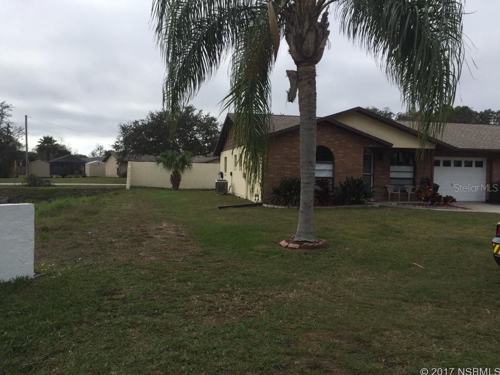 2 bedroom 2 bath  spacious corner lot, view of pond, nice patio out back with privacy wall1 car garage with remote, attic storage, outdoor showerconvenient location, community pool and center
