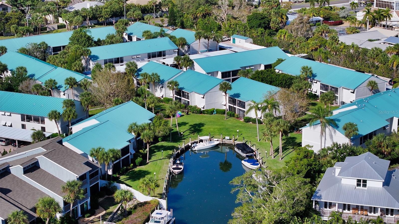 PRICE IMPROVEMENT. Exceptional Value on Siesta Key

Rarely available and beautifully updated, this second-floor 1-bedroom, 1-bathroom residence in White Sands Village offers the perfect blend of coastal living and investment opportunity. Ideally located just across the street from Siesta Key Beach, the condo also enjoys a coveted view of the lush interior courtyard, providing a peaceful and serene setting.

This turnkey furnished unit is move-in ready and features a bright, open floor plan with tasteful coastal updates throughout. The enclosed lanai adds valuable additional living space, ideal for relaxing or entertaining. The A/C system is serviced annually and is in excellent working condition, offering added peace of mind.

White Sands Village is a hidden gem, known for its affordability, strong amenities, and rental flexibility. Residents enjoy a heated community pool, a newly renovated clubhouse with kitchen and gathering spaces, beautifully maintained grounds with paver roadways, and covered carports. Community boat docks are available on a first-come basis for a nominal fee. Small pets are welcome for both owners and tenants—an increasingly rare benefit on Siesta Key.

With a two-week minimum rental policy and an on-site rental agent, this community supports steady income potential, making it equally attractive as a personal retreat or investment property. The nearby free Siesta Key trolley provides easy access to Siesta Key Village, dining, shopping, and downtown Sarasota’s cultural and dining scene.

This price improvement enhances an already compelling opportunity to own in one of Siesta Key’s most desirable communities—where comfort, location, and income potential come together seamlessly.