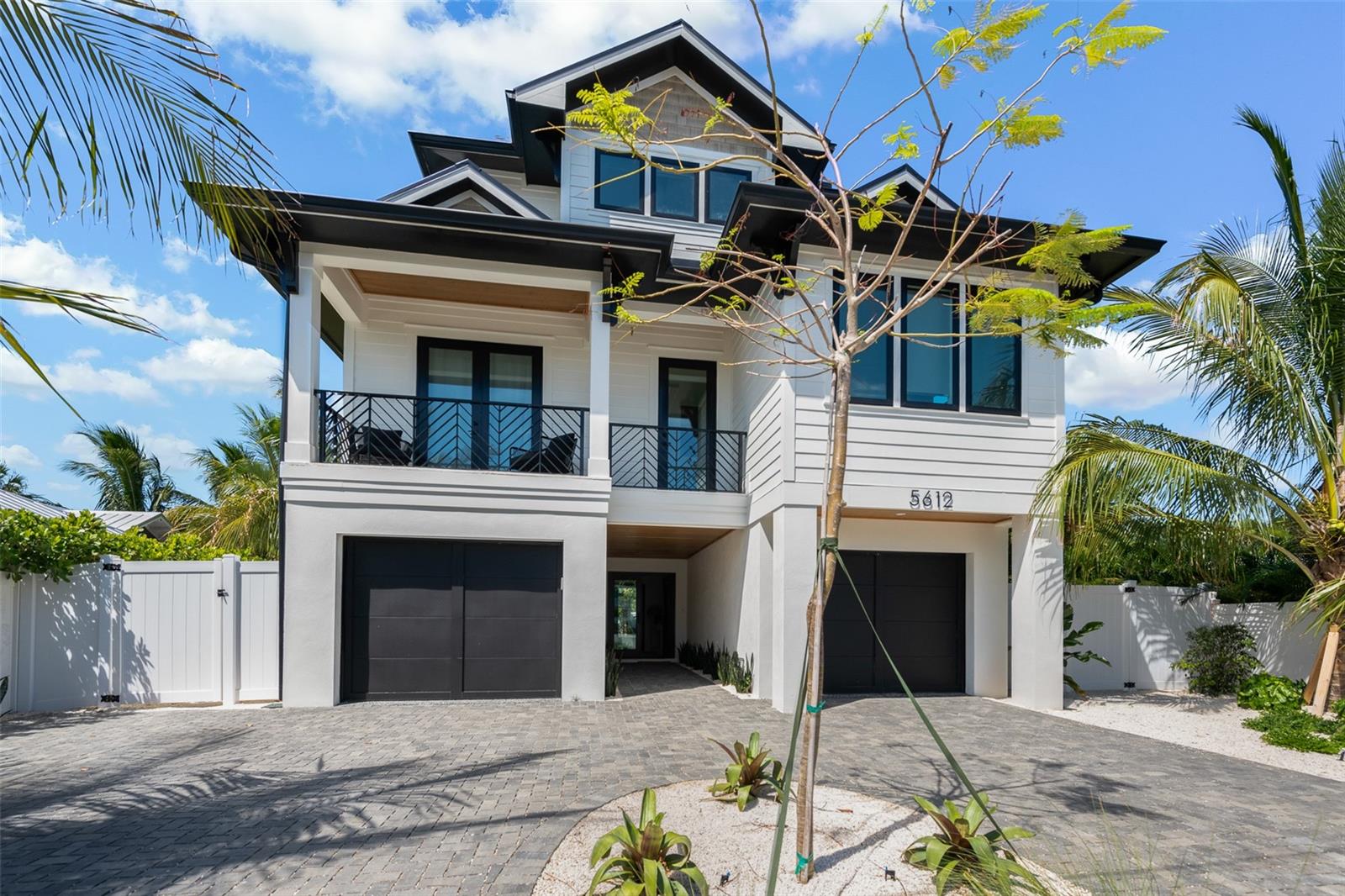 Striking modern luxury meets investment potential at The Black Pearl, a four-bedroom, five-and-a-half-bath residence located just a short walk from the beaches of Holmes Beach, downtown shopping and dining, and the island trolley. This architecturally distinctive black-and-white home features a private black-bottom infinity-edge pool, resort-style outdoor living, and a rooftop deck with panoramic Gulf views.
Designed for both lifestyle and performance, the home offers a bright open-concept interior, gourmet kitchen with island seating, and four king bedroom suites—each with a private ensuite bath—plus a bonus den with additional sleeping flexibility. Outdoor amenities include a full outdoor kitchen, multiple lounge and dining areas, outdoor shower, and ample on-site parking.
Currently part of the Exclusive Vacations luxury rental program, the property offers immediate access to a professionally managed, high-end short-term rental platform focused on premium positioning, elevated guest experience, and revenue optimization.
A rare opportunity to own a visually iconic, walkable luxury home with proven short-term rental appeal on Anna Maria Island.