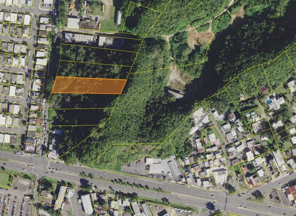 A 3,932-square-meter lot (approximately 1 cuerda) located directly on State Road 872 (Camino Camaselles/Rio Plantation), offering unmatched visibility and logistics in one of Bayamón's busiest sectors. Unbeatable Location: Boasts direct frontage right on PR-872 (Camino Camaselles/Rio Plantation) for maximum traffic exposure. Premium Connectivity: Located just 1 minute approximately from PR-29 (West Main Ave.), allowing seamless transit connections across the region. Minutes from Retail: Situated only 5 minutes approx. from Plaza Del Sol Shopping Center, giving you immediate access to major retail stores, dining, and banking. Generous Size: Spans 3,932 square meters of versatile land, perfectly suited for flexible architectural layouts. Retail & Dining: 5 minutes approx. to Walmart, Home Depot, Caribbean Cinemas, and dining options at Plaza del Sol.  Healthcare: Less than 10 minutes approx. from the Hato Tejas Medical Center and surrounding clinics. Major Arteries: Rapid access to PR-2 and PR-22 (Jose de Diego Expressway) for a fast commute to San Juan. this high-exposure location provides the perfect foundation for a project success. Contact us!