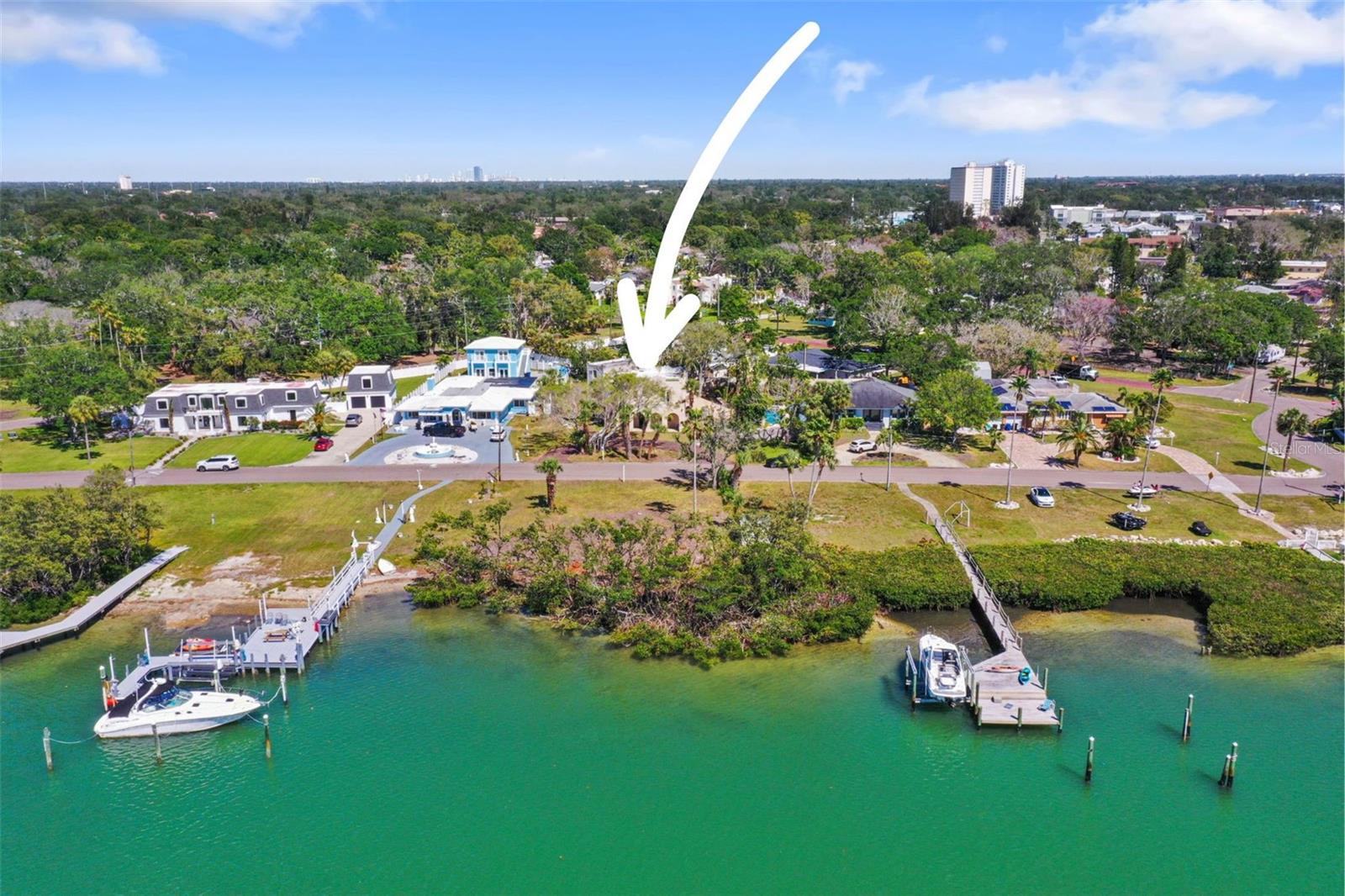 COME AND BUILD YOUR NEW HOME ON HISTORIC SUNSET DRIVE!!! Attention Builders and Developers! Do not miss this incredible opportunity to own this beautiful waterfront property IN THE HISTORIC OLD PASADENA AREA with INCLUDED WATER LOT Across Sunset Drive (19-31-16-00000-330-0200), OVERLOOKING THE SPARKLING WATERS OF BOCA CIEGA BAY and west facing for breathtaking sunset views; BOTH LOTS COMBINED EQUALING 1 ACRE M.O.L.! 101-foot-wide double lot and 97 feet of waterfront. No seawall, just natural barrier, so no seawall maintenance. WEST FACING FOR PERFECT FLORIDA SUNSETS! ENJOY ALL THE BENEFITS OF LIVING ON THE WATER BUT WITH THE ADDED BENEFIT OF ALSO HAVING A LARGE PRIVATE BACK YARD WITH POOL AND ALLEY ACCESS. This property is so quiet and peaceful; it is the perfect location for living the best beach life but without the drawbacks of being on the barrier islands with all the tourist, hotels etc. Located right around the corner from Palms of Pasadena Hospital and an easy drive to Downtown St. Pete, I275 and a 5 minute drive to Treasure Island or St. Pete Gulf Beaches. Zoned for an ADU (accessory dwelling unit), A RARE AND VALUABLE FEATURE! Property was impacted by Hurricane Helene and no repairs will be done by the sellers. Property being sold as is. Information on this property has been provided by both the seller and public records and is believed to be accurate, but buyer should verify all information and conduct any research they deem necessary for their purchasing decision up to and including building/zoning and FEMA Requirements. WATERFRONT PROPERTIES AND OPPORTUNITIES LIKE THIS RARELY BECOME AVAILABLE, SO CHECK THIS ONE OUT BEFORE IT'S GONE!