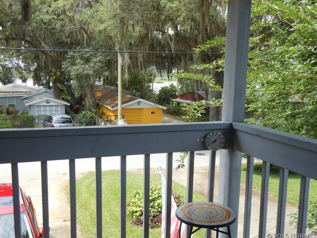 Living in paradise. Have your own 1 bedroom 2 bath apartment with balcony view of Rose Bay on street side and large balcony overlooking rear yard and pool